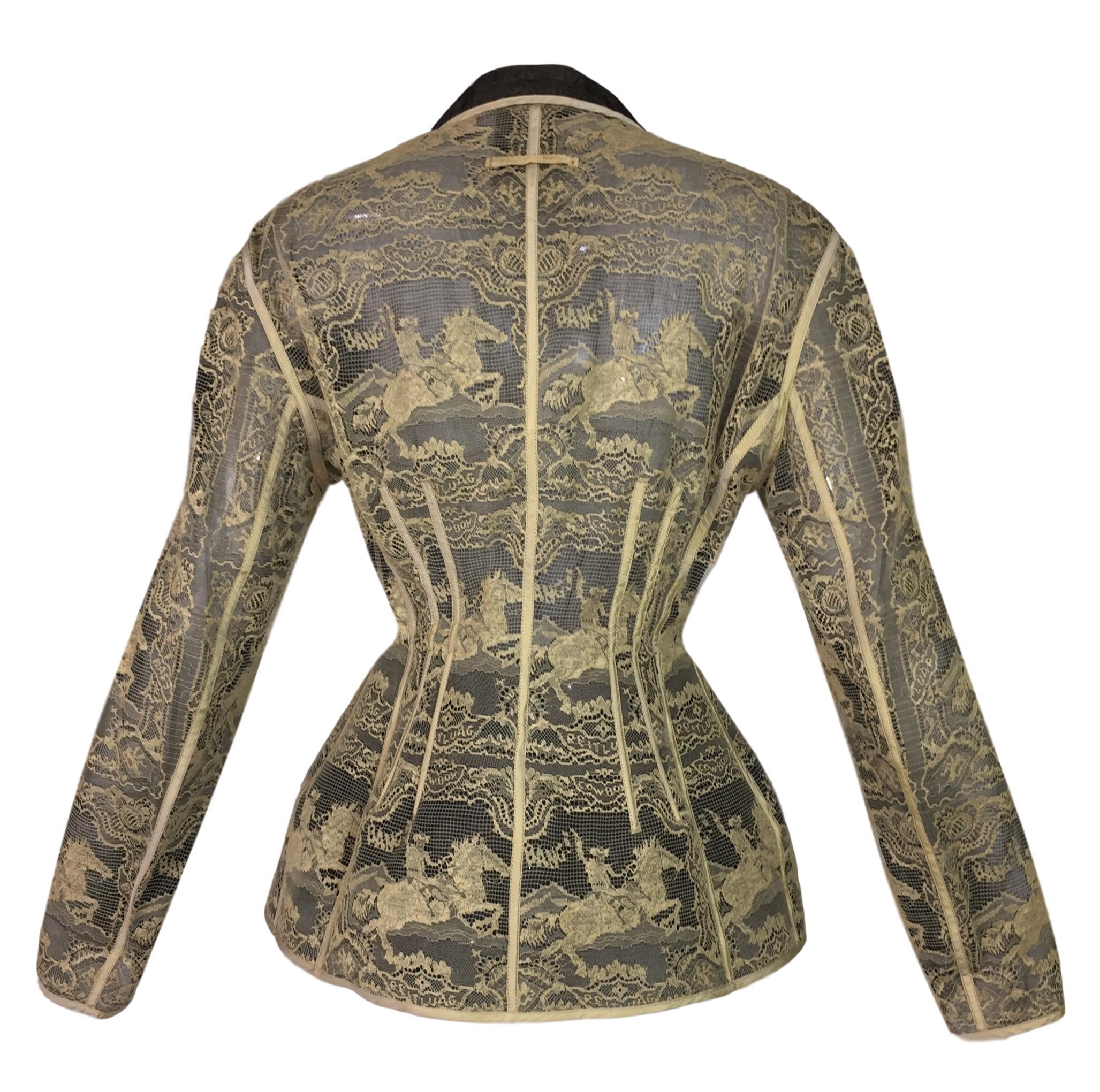 DESIGNER: S/S 1988 Jean Paul Gaultier- this is a very rare museum worthy piece! It is a sheer black under layer with a spectacular lace top layer designed with a western cowboy pattern. The waist is cinched with a thick structured fabric layer at