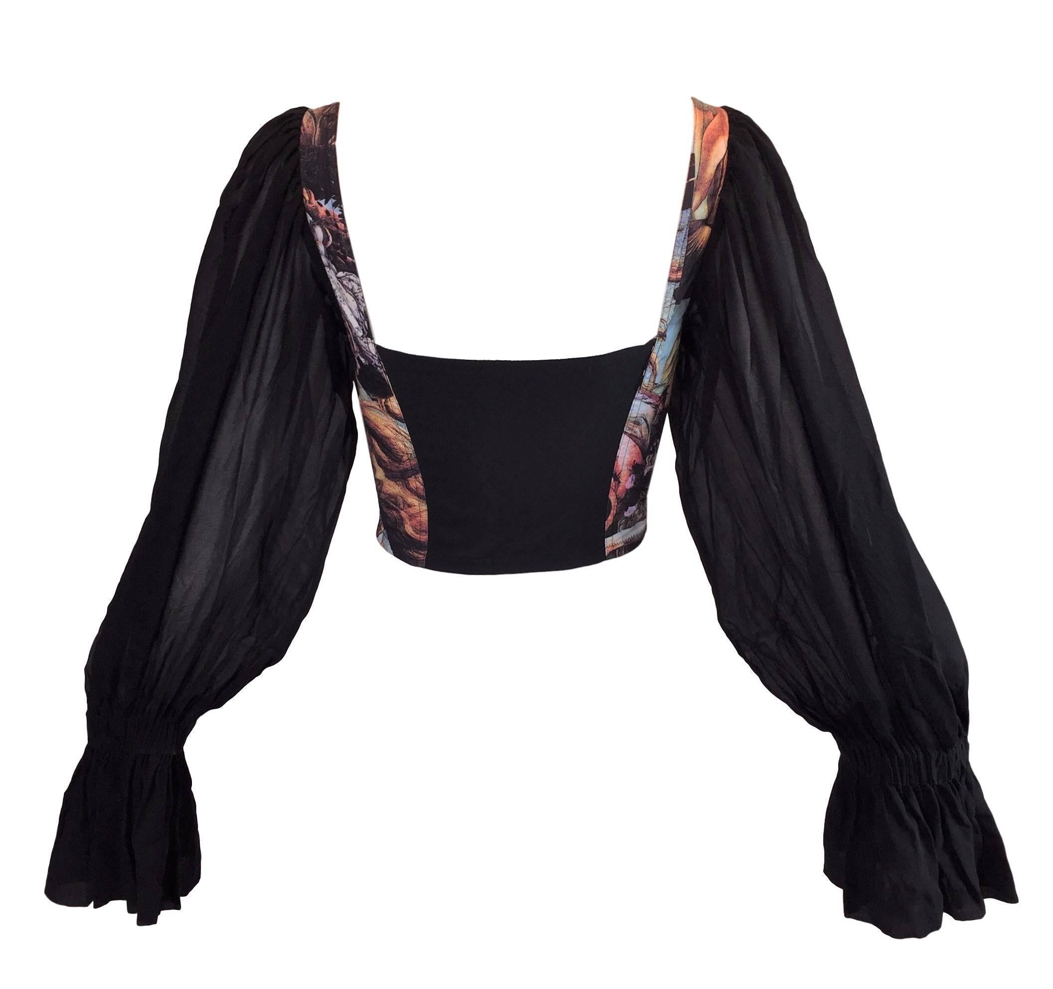 DESIGNER: S/S 1993 Dolce & Gabbana

Please contact for more information and/or photos.

CONDITION: Excellent

MATERIAL: Cotton bustier with sheer silk sleeves.

COUNTRY MADE: Italy

SIZE: 44- runs small

MEASUREMENTS; provided as a courtesy only-