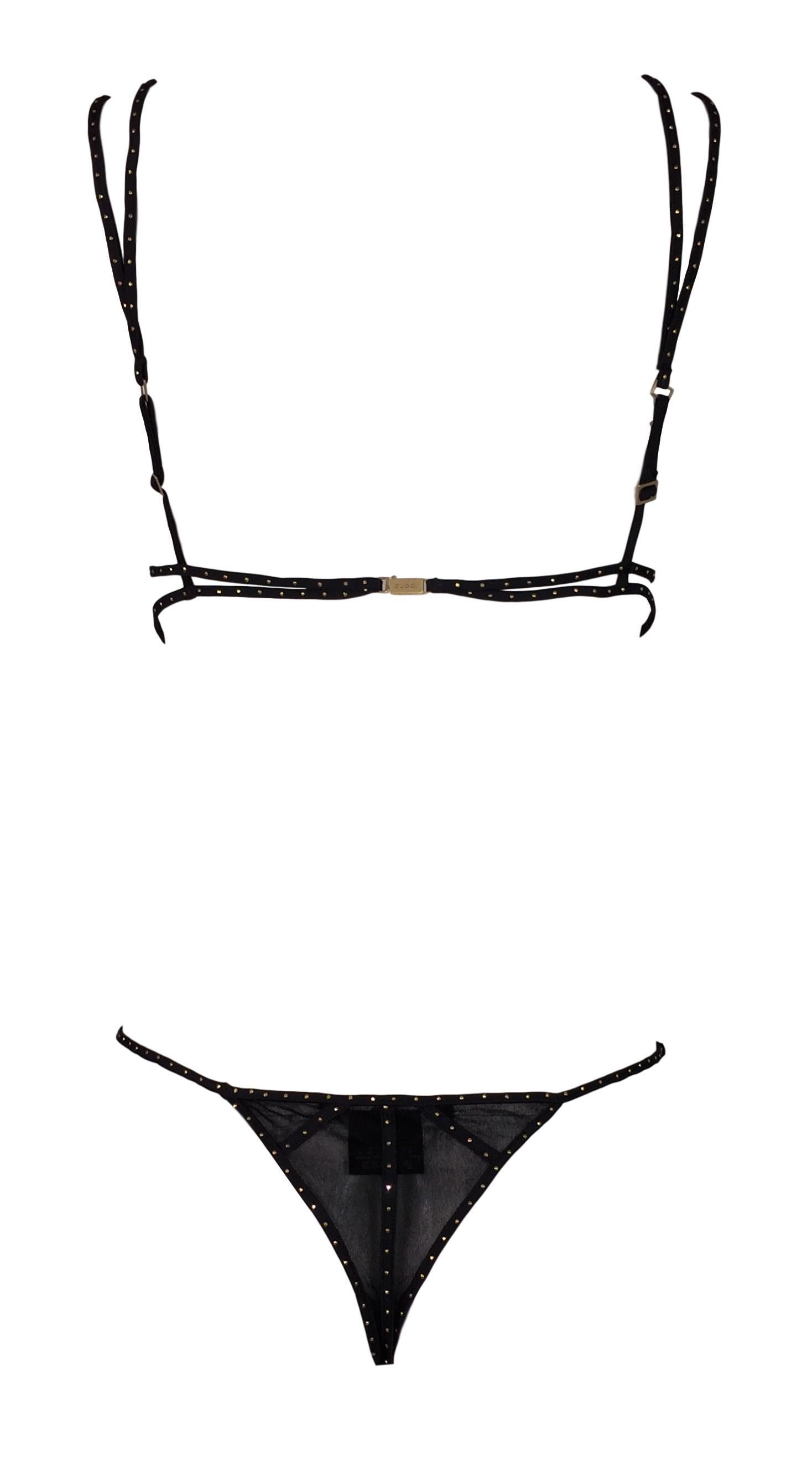 DESIGNER: F/W 2003 Gucci by Tom Ford

Please contact for more information and/or photos.

CONDITION: Unworn with tags- elastic is not as stretchy with age. 

FABRIC: Nylon & Spandex

COUNTRY MADE: Italy

SIZE: L- runs small with