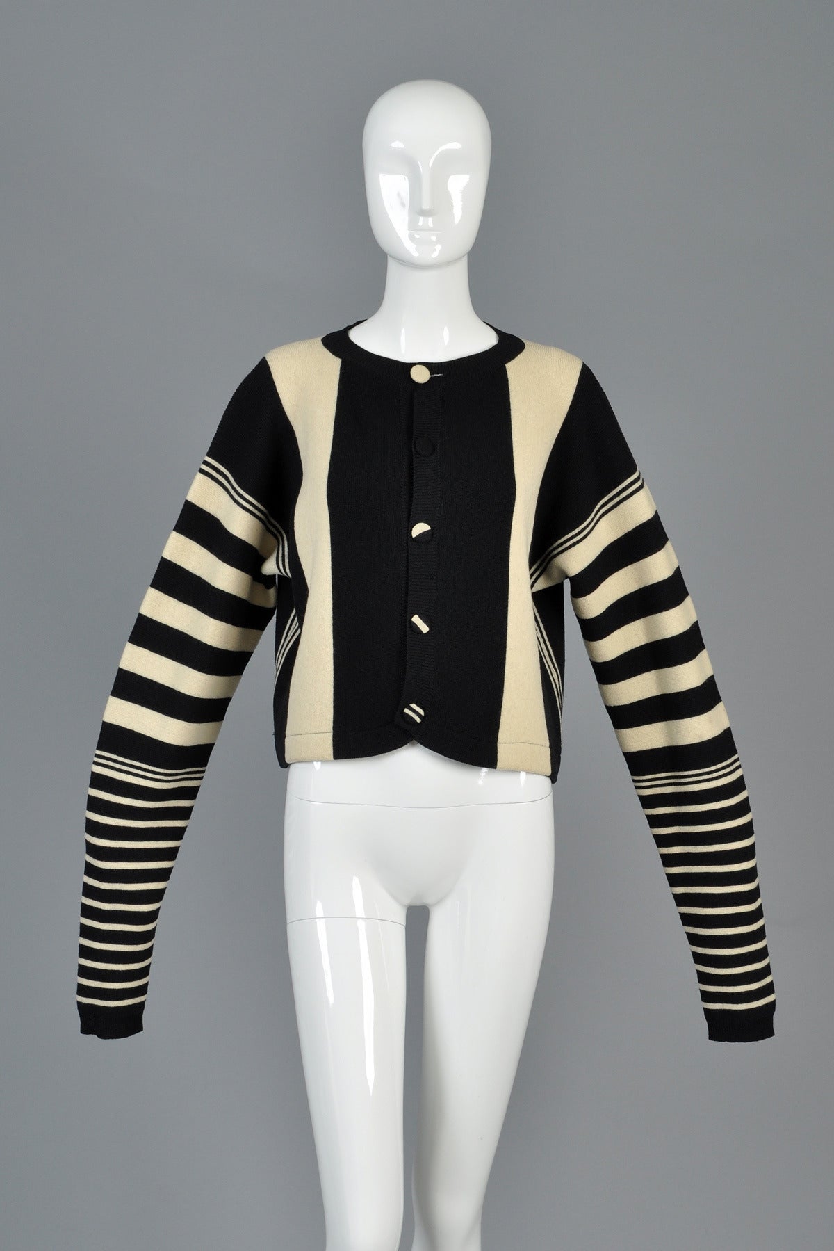 Super rare vintage 1980s striped sweater from Yohji Yamamoto’s Workshop label. Graphic black + white striped wool knit jacket with insanely long sleeves. Awesome cropped, boxy fit. Looks great buttoned or worn open. In excellent condition with the