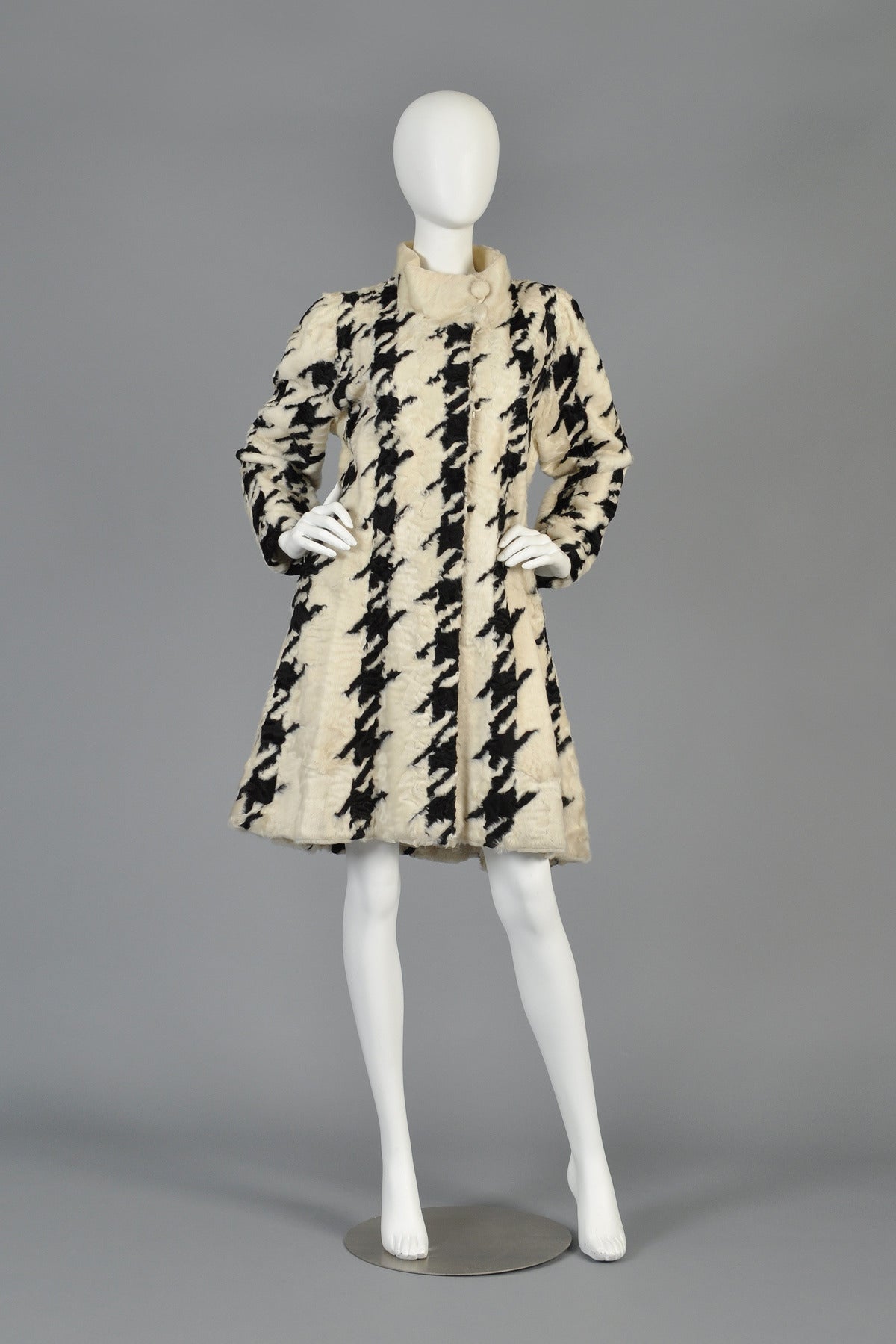 Seriously amazing 1960s houndstooth Swakara broadtail lamb fur coat. Broadtail lamb is a member of the karakul sheep family and is the most highly valued + coveted fur, well above the more common persian lamb variety. AMAZING and extraordinarily