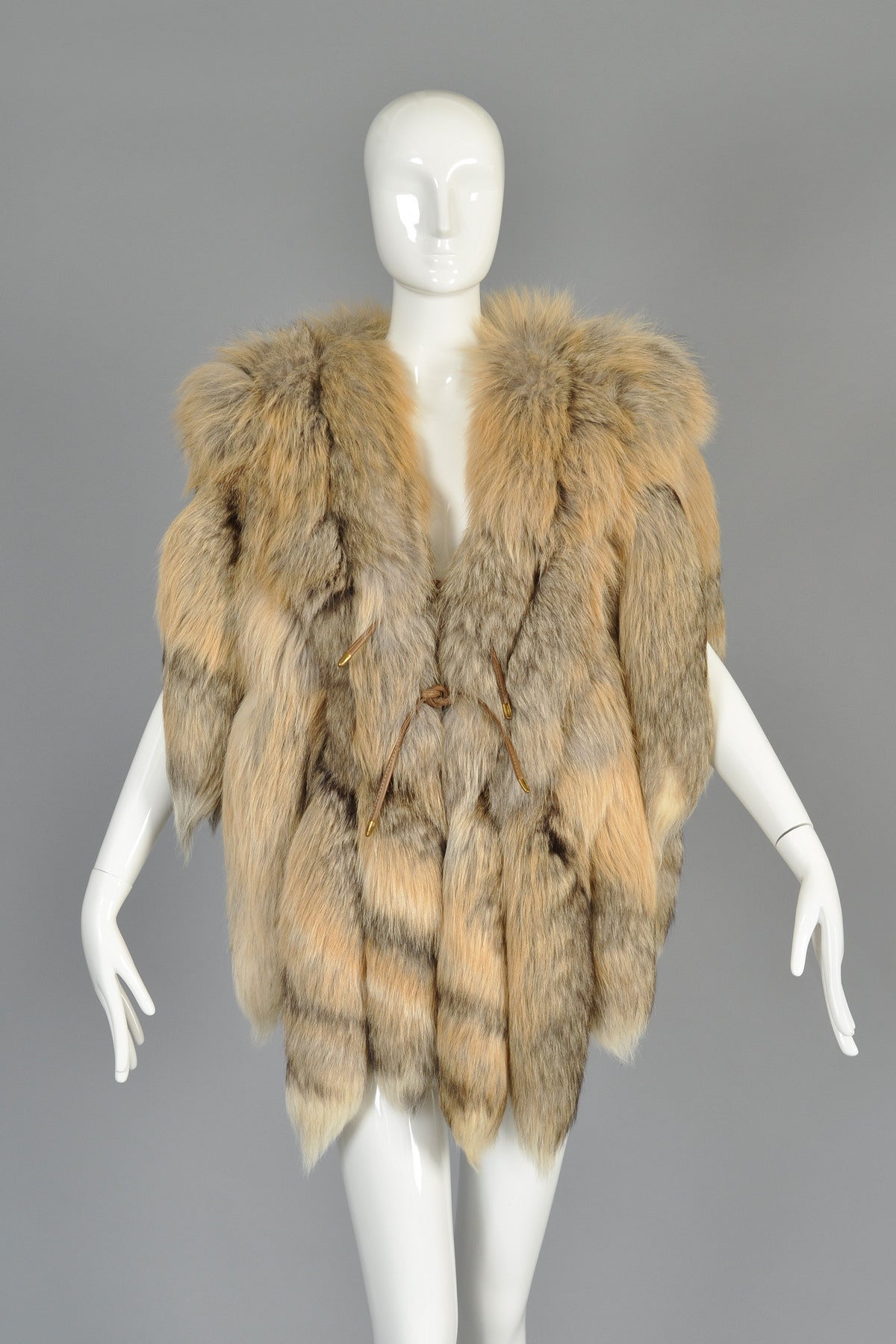 Killer early late 1970s/early 1980s fringed fox-tail vest. Amazing find in an extremely hard to find color palette. We've had several of these over the years but never a golden island fox! Comprised entirely of tails, this piece will be a gorgeous