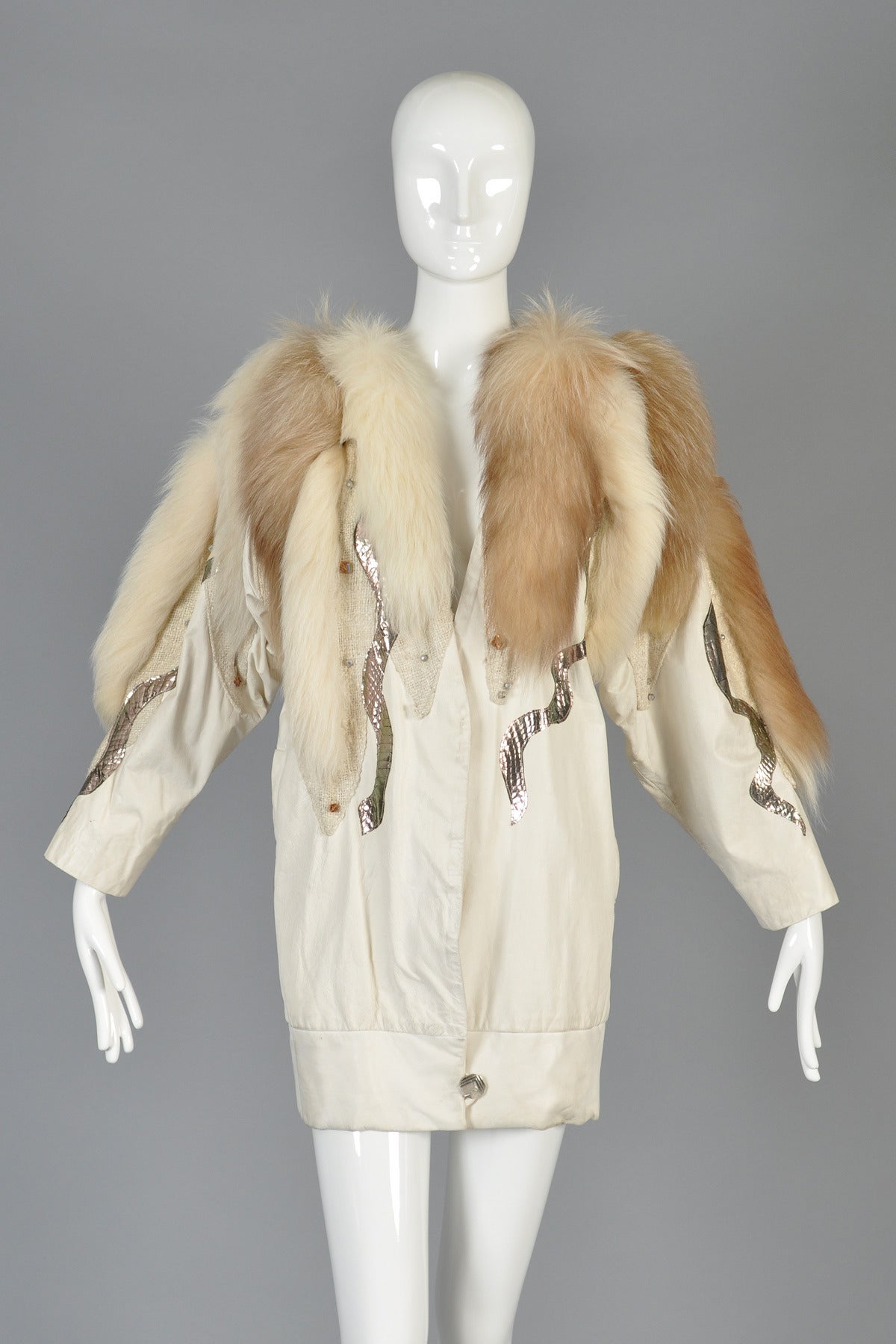 *Recently reduced from $695 to $495*

Incredible vintage 1980s avant garde leather, fox fur + snakeskin creation by Kip Kirkendall. We are always so happy when we come across a Kip Kirkendall design - they embrace the epitome of avant garde 80s