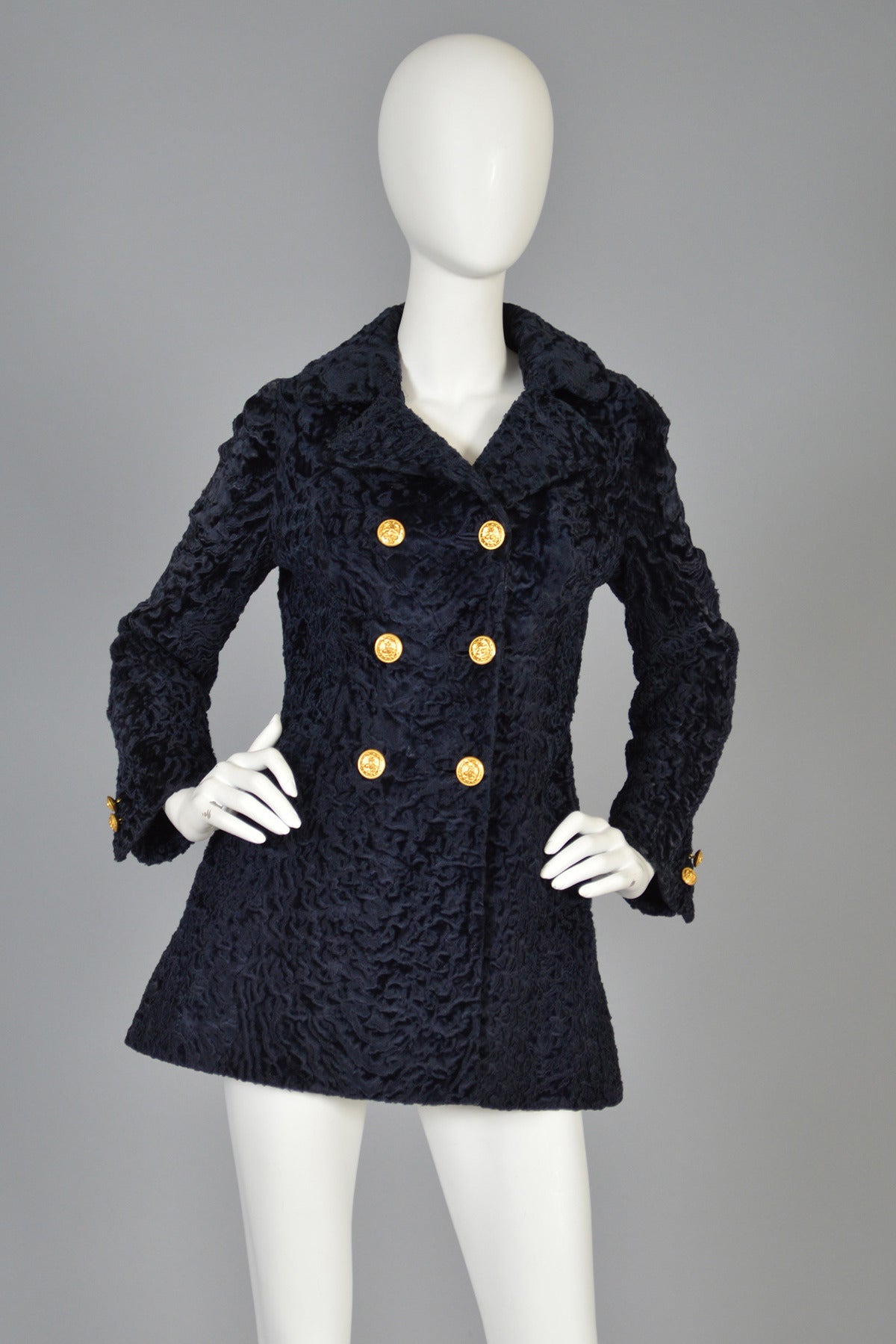 Lovely 1960s midnight blue genuine broadtail fur coat but the famed Reiss & Fabrizio. Reiss & Fabrizio were famed NYC furriers who did many fur pieces for both Hollywood and Broadway - including Bab's iconic Jaguar suit in 1964's Funny Girl. 