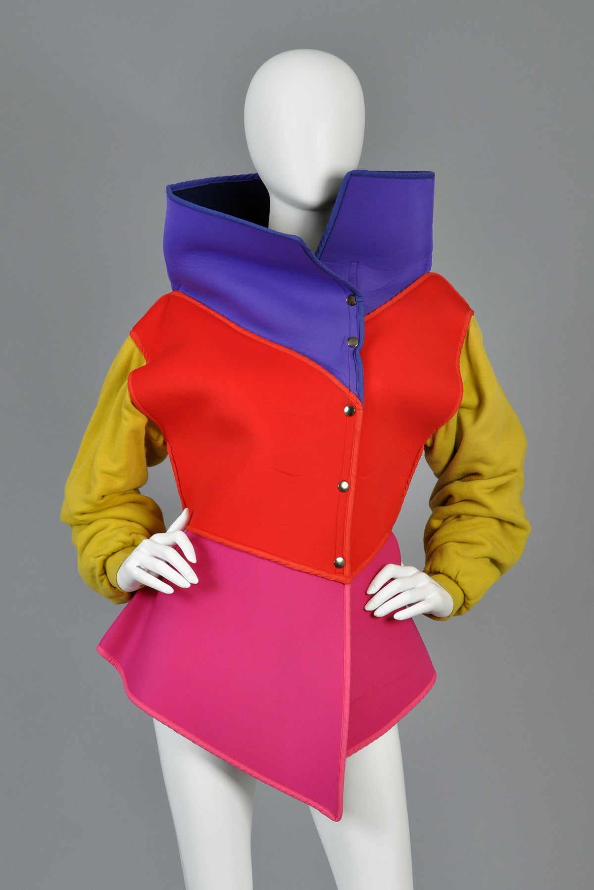 Seriously awesome circa F/W 83/84 Kansai Yamamoto neoprene and cotton jacket. Such an amazing find! Kansai items are nearly impossible to find and we couldn't believe it when we came across this little gem! 

Fun jewel toned color blocked neoprene