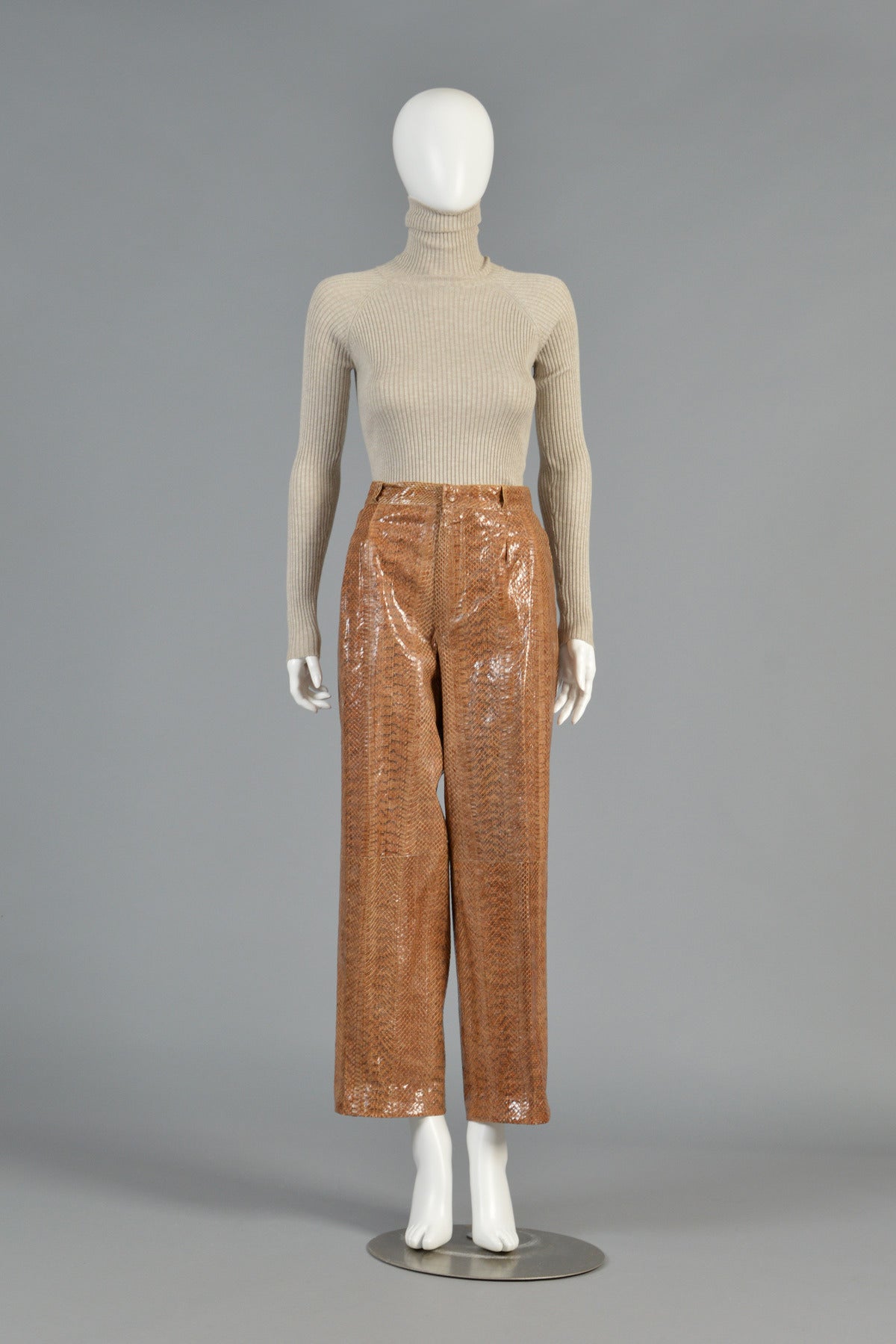 Seriously awesome 1980's genuine snakeskin pants. INREDIBLE, hard to find piece! Super high waist with wide legs. Zip front with top snap. Fully lined. Excellent vintage condition - unworn and still retains original sales tags. Best fits size M/L.