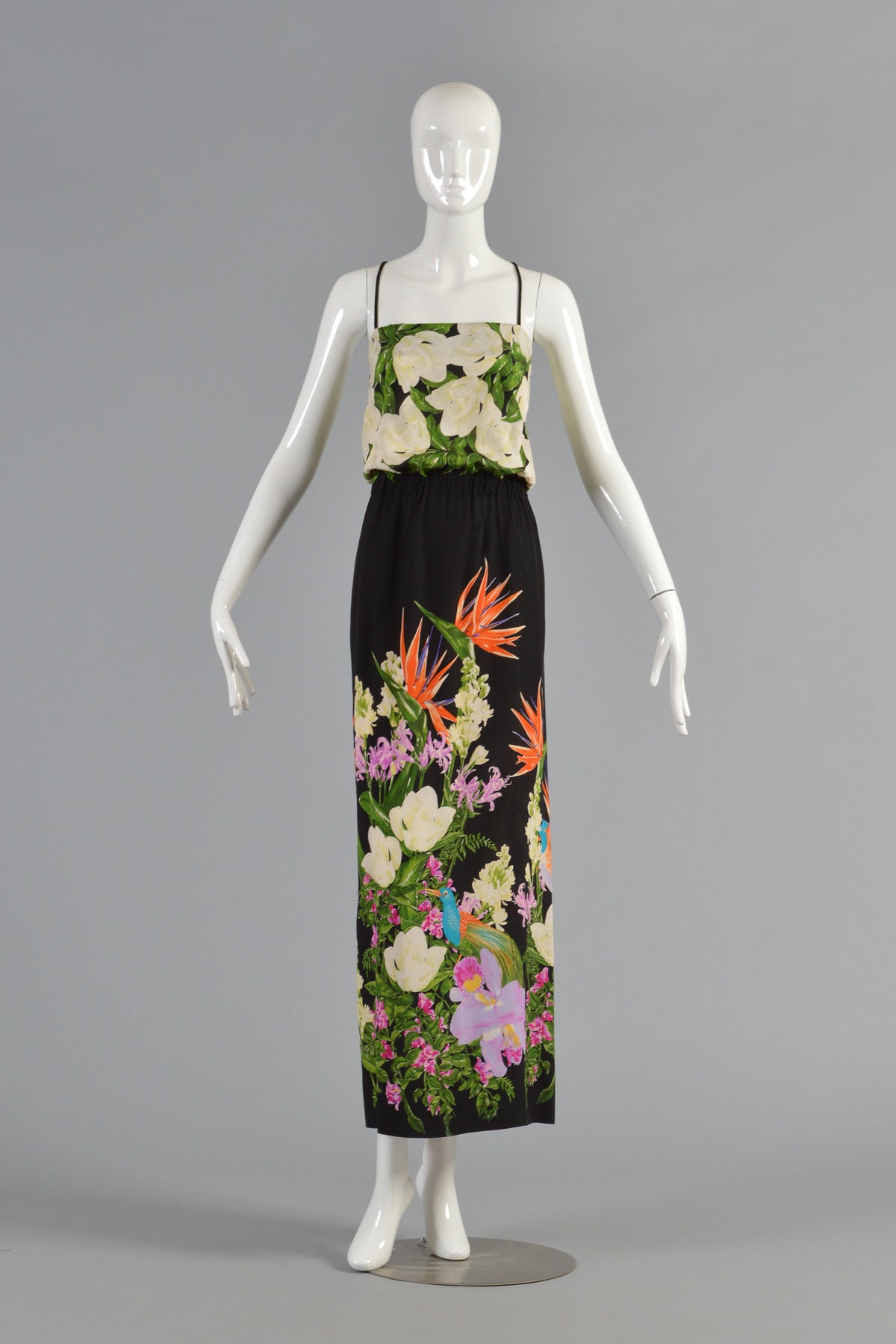 Beautiful 1970's/80s silk dress. This absolutely lovely, one-of-a-kind hand tailored find is perfect for any summer engagement! Classic blousy top with spaghetti straps, elastic waist and slit in the back. Killer birds of paradise pattern. Excellent