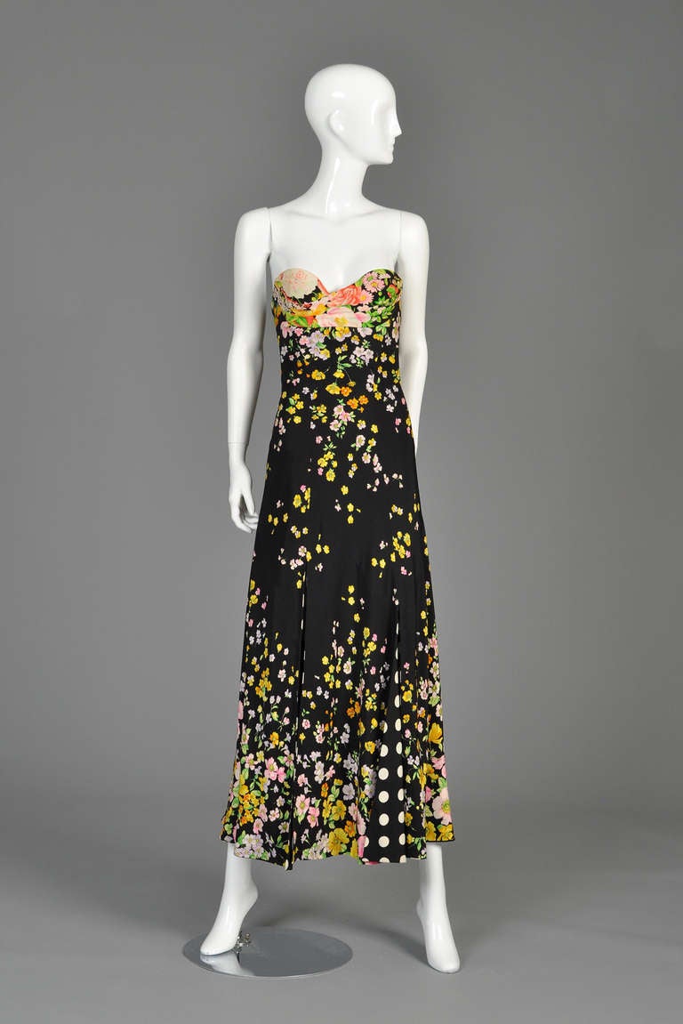 Absolutely stunning iconic S/S 1993 floral and polkadot couture gown by Gianni Versace. Truly an incredible find and one we haven't seen available for sale anywhere in the past 10 years. Gathered silk floral shelf bust with contrasting floral fitted
