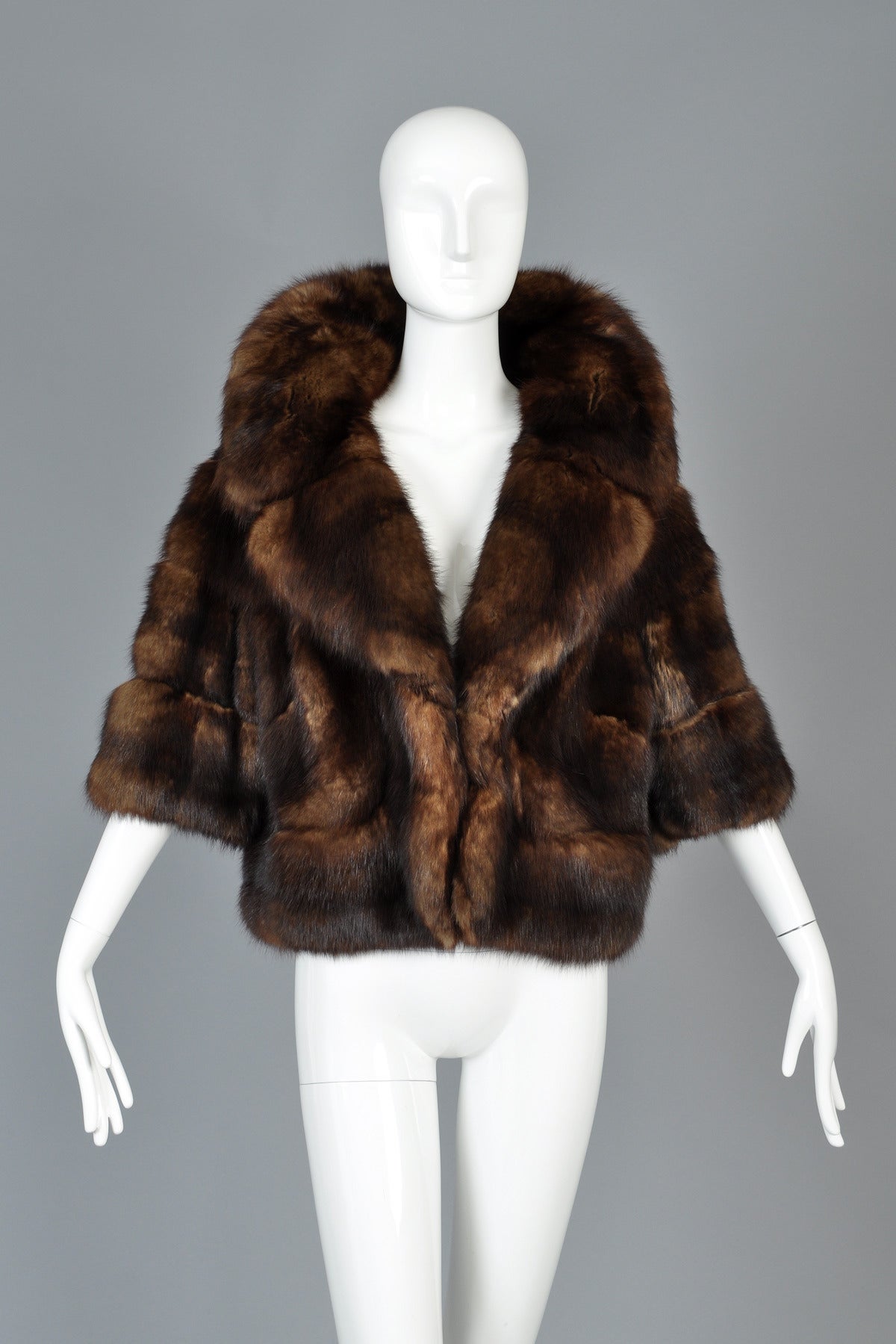 Truly stunning vintage 1960s genuine natural Russian Sable cropped trapeze coat. Such a rare, hard to find piece! Sable is the Mercedes Benz of furs and a full length sable coat usually costs upwards of $100,000+ new. This little piece is so special