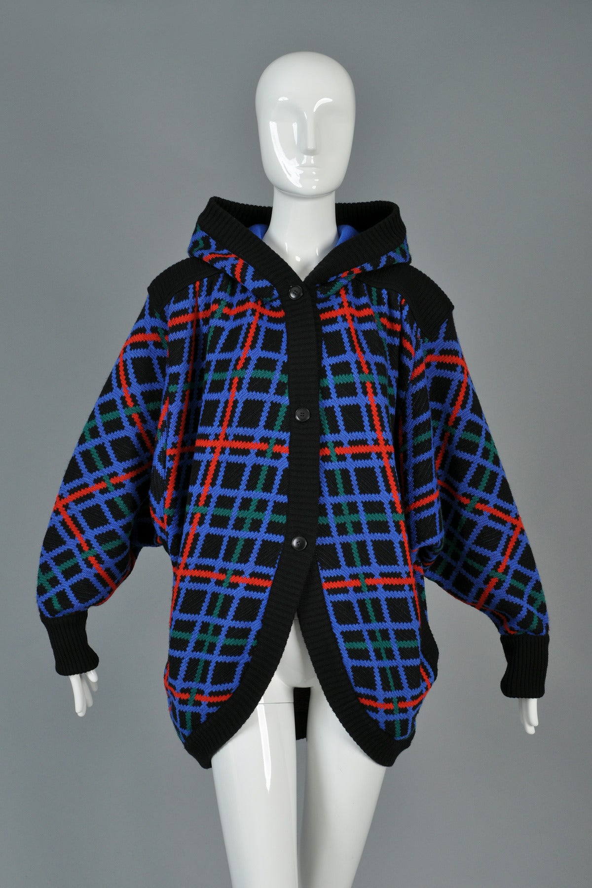 Super awesome 1980s vintage Yves Saint Laurent plaid knit cocoon jacket. Super rare find - so wearable, comfy + modern! Button front with cutaway cocoon hem + hood. Super heavy and cozy - could definitely work as a warm coat with a few layers