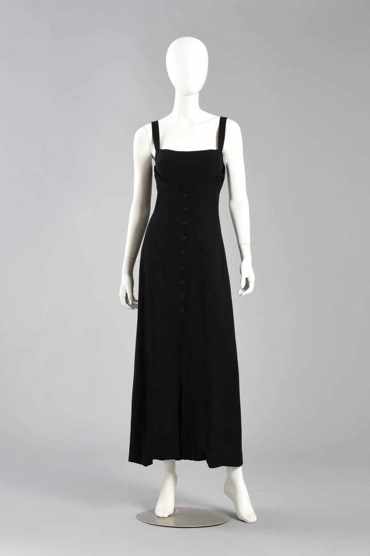 Excellent 1990s Karl Lagerfeld evening dress with shelf bust. Super sleek on right on trend for 2016! Super fitted black rayon body with button front and incredibly sexy shelf bust.  Made from slinky viscose rayon. Fully lined in silk. Excellent