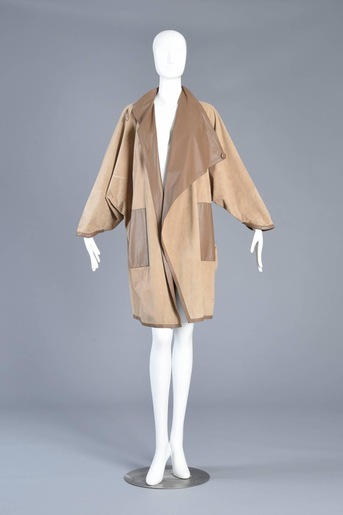Incredible 1980s Reversible Suede Leather Avant Garde Draped Cape

MEASUREMENTS
Bust: 62