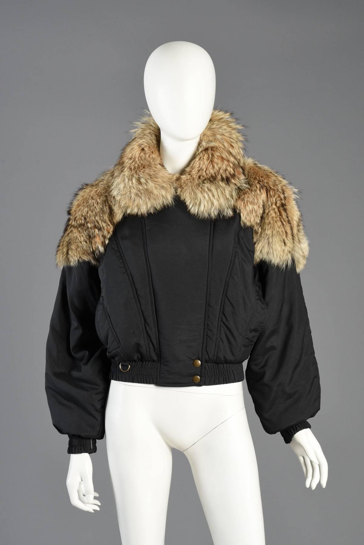 Make a statement on the slopes or Midtown with this awesome vintage 1980s puffy ski jacket. Black puffy bomber/ski style jacket with massive coyote fur mantle. Fully lined. Fur is soft + supple with no shedding or odors. Excellent vintage condition.
