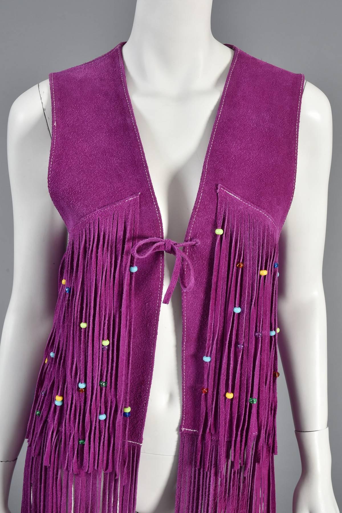 purple fringe vest