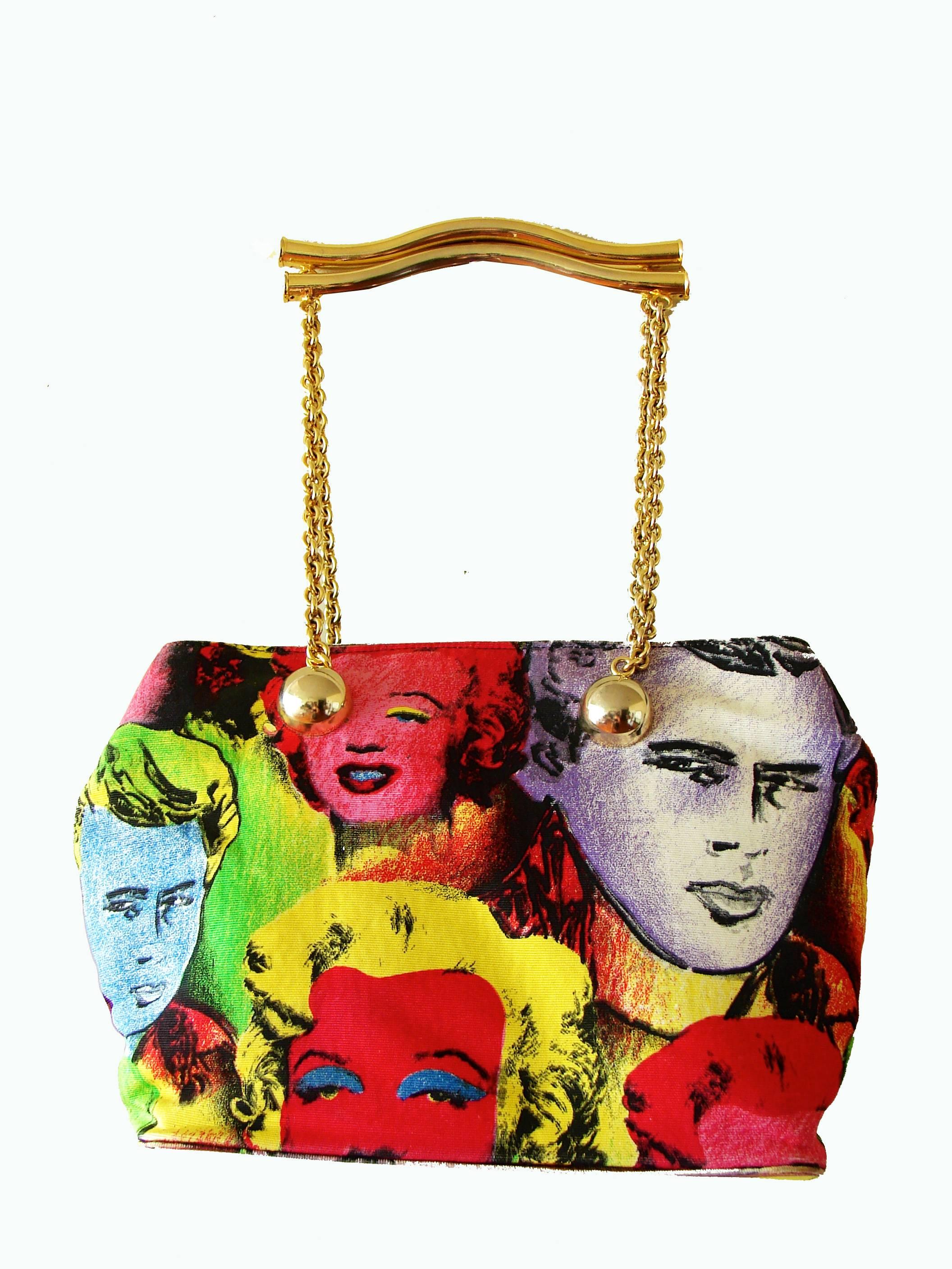 Here's an incredibly rare handbag from Gianni Versace's 1991 Warhol Collection - very similar to the reboot that Donatella recently introduced at Milan Fashion Week.  Made from painted canvas, it features Versace's homage to Warhol's pop art prints