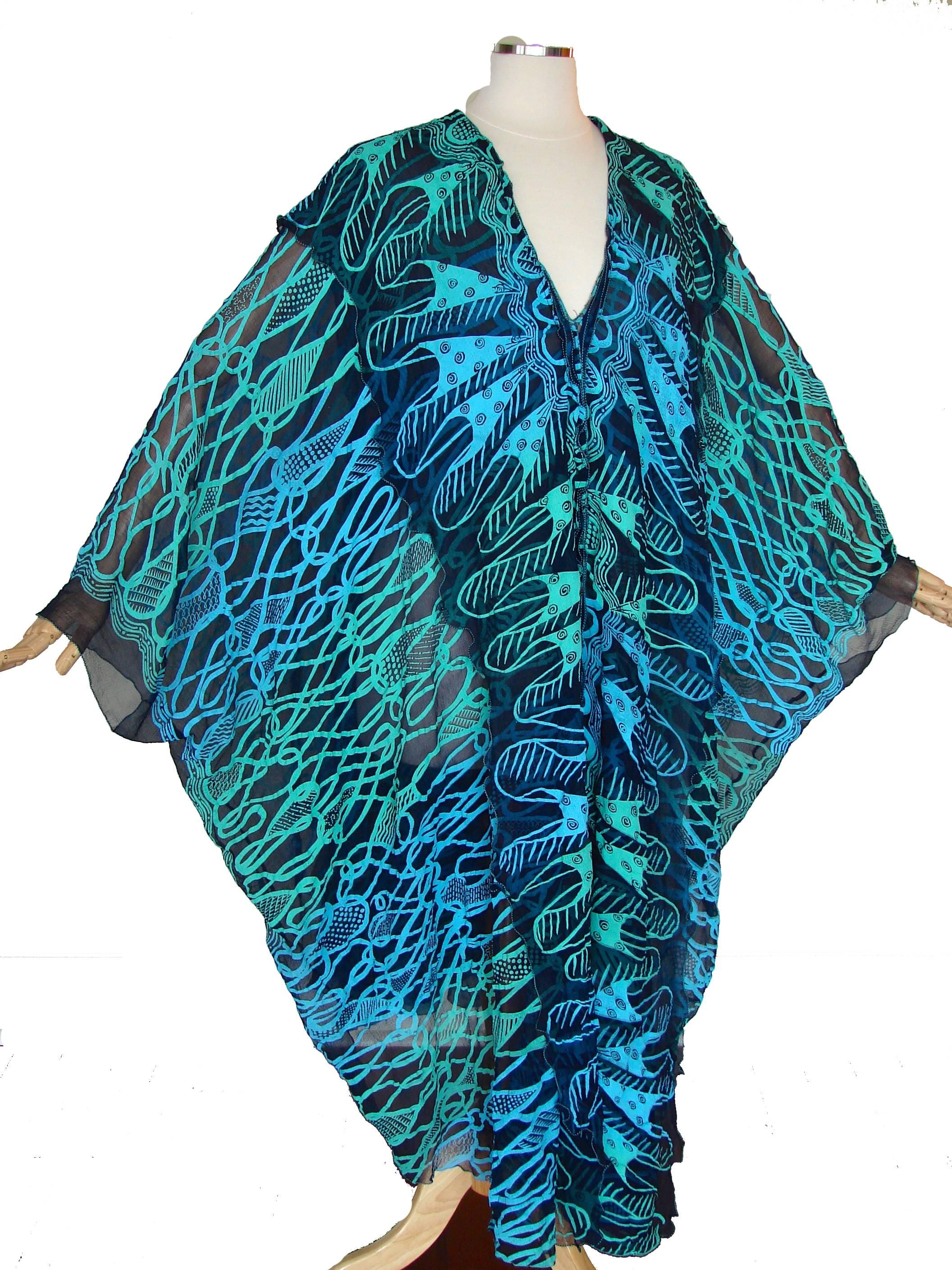 Here's an incredible sheer silk Kaftan from Zandra Rhodes London.  Perfect for resort or holiday gathering around the pool.  In excellent condition.  Tagged size medium and true to modern size, approximate measurements, laying flat and doubled where