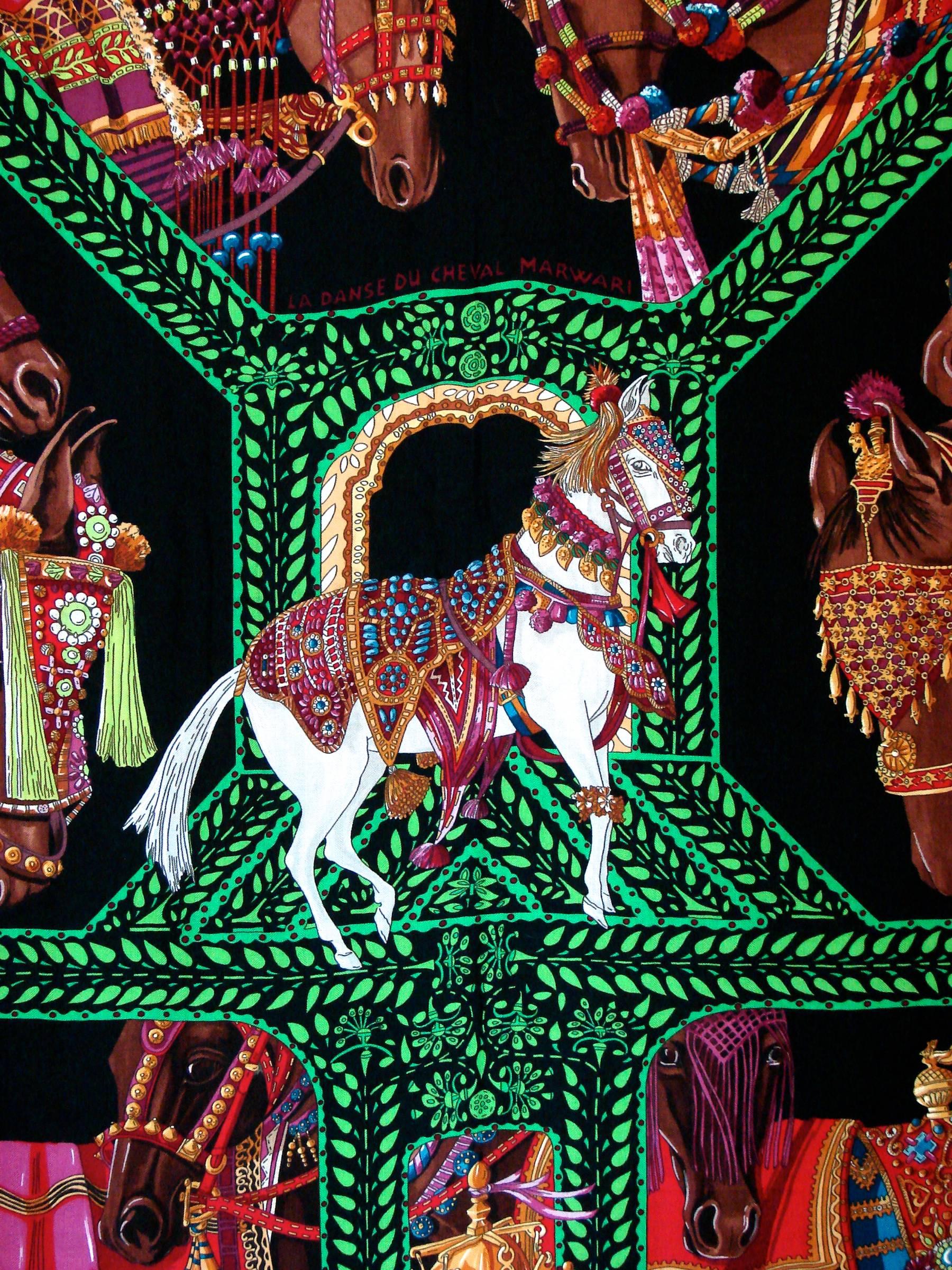This fabulous cashmere and silk blend shawl was designed by French artist Annie Faivre for Hermes.  Rare colorway from the 1980s and in pristine condition with no issues to report.  Measures 140cm or 55