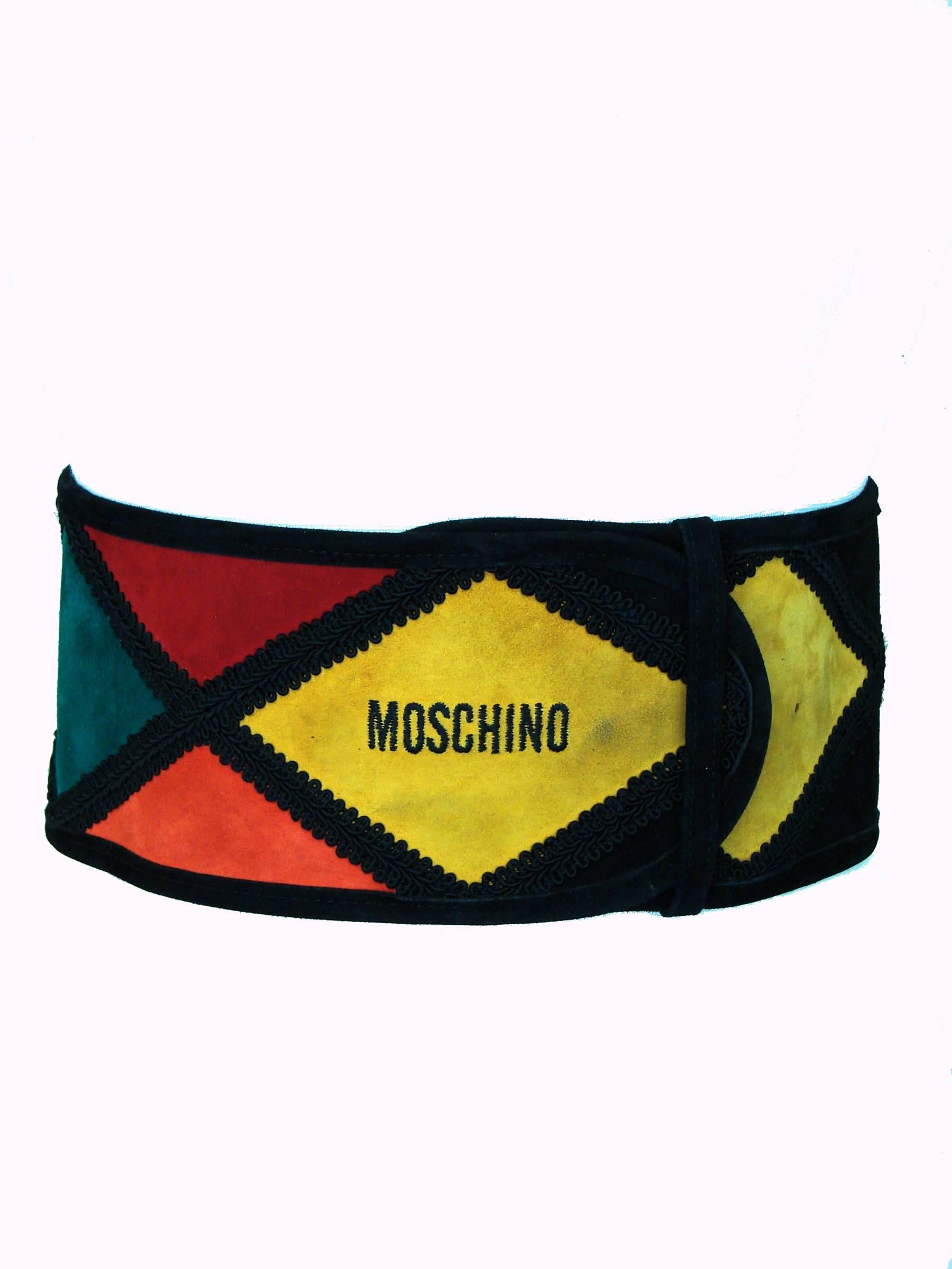 An incredible wide suede leather belt from Moschino by Redwall Italy from the 1980s. In excellent condition, with some minor rubs here and there on the suede. Measures 4.5