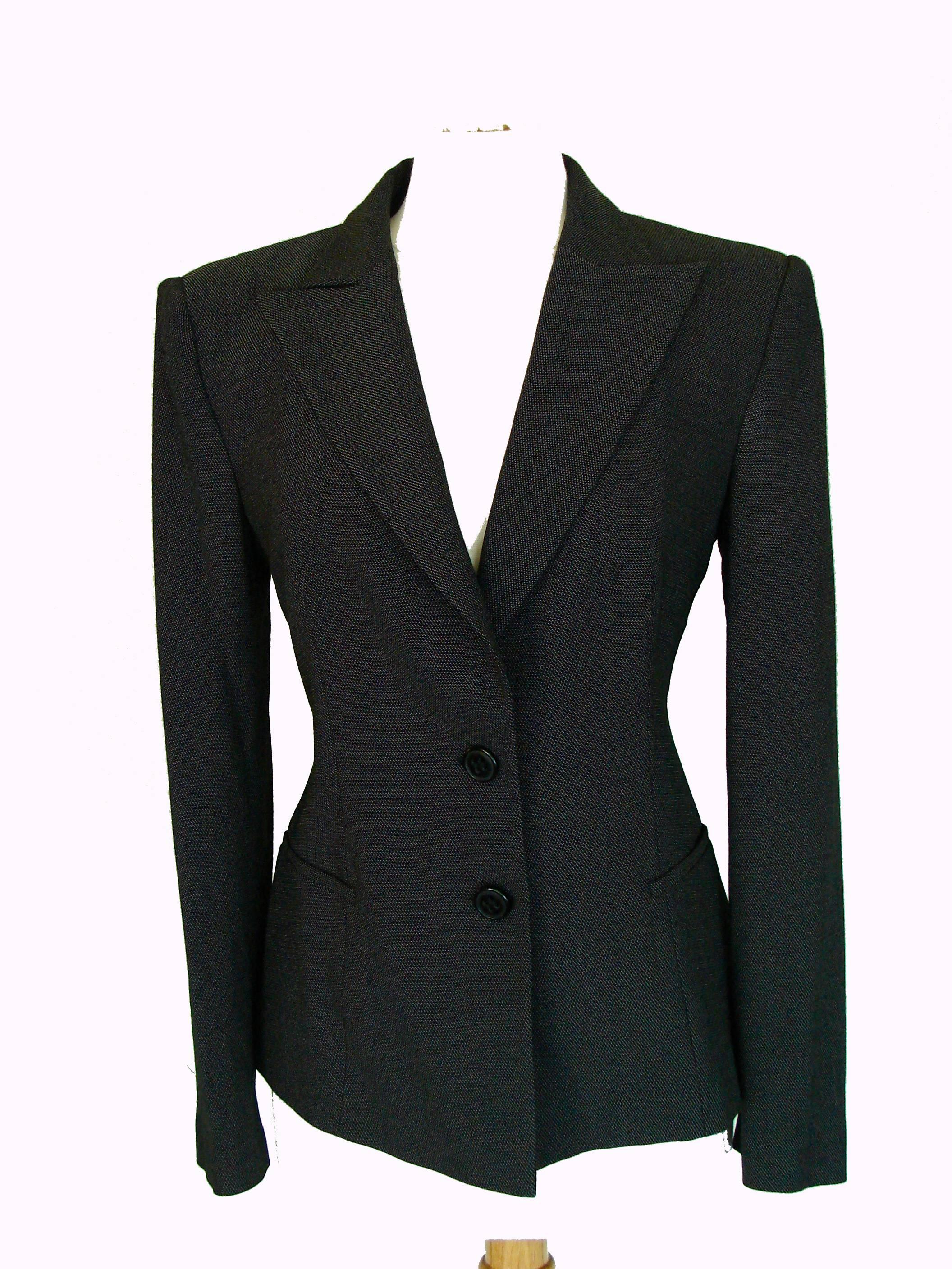 Great blazer jacket from Emporio Armani by Giorgio Armani.  In excellent condition, it's fully lined.  Tagged size 48, it measures, taken flat and doubled where appropriate: shoulders - 17