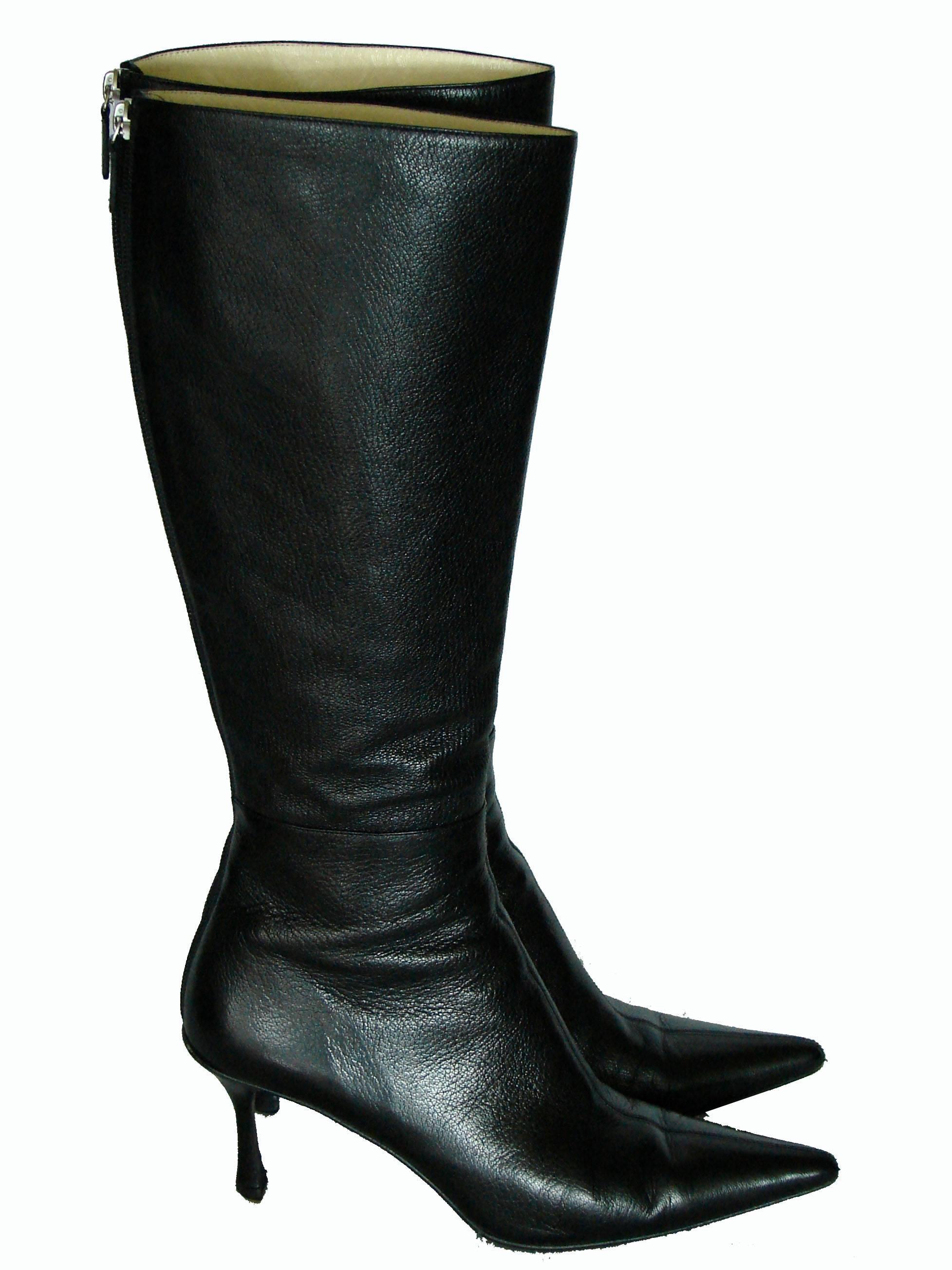 Here's an iconic pair of knee-high boots from GUCCI.  Made from black kidskin leather, these feature kitten heels and fasten with rear zippers.  In excellent condition overall, these appear to have been worn only a few times.  There is some wear to
