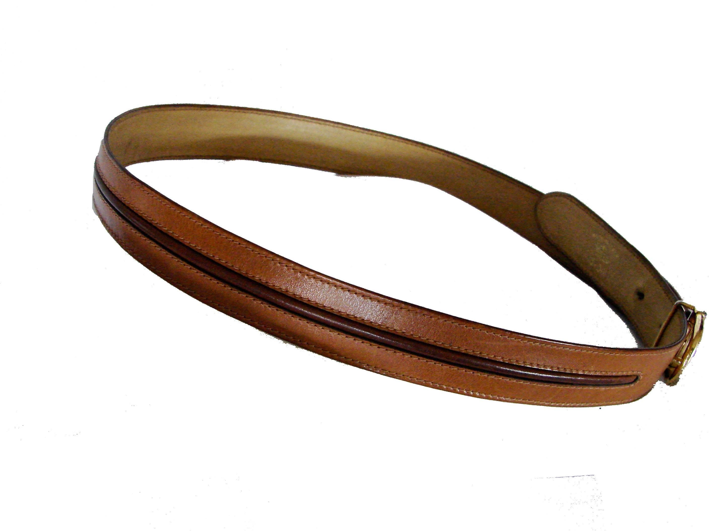 Gucci Tan and Brown Leather Belt with Horse Bit Buckle Size 75 30 1970s In Good Condition In Port Saint Lucie, FL