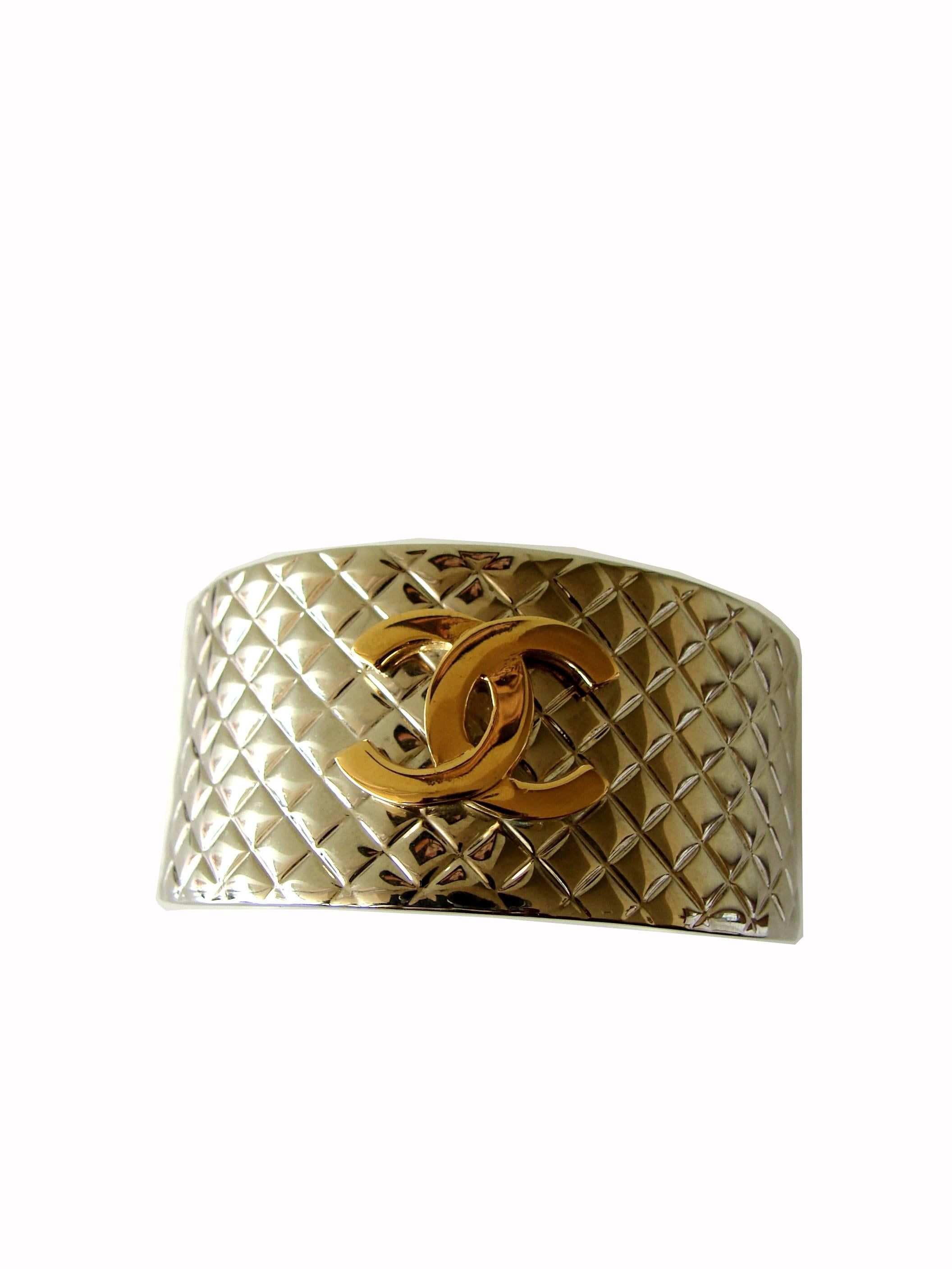 Contemporary Chanel Silver Matalasse Cuff Bracelet with Gold CC Logo + Box 98P Collection 