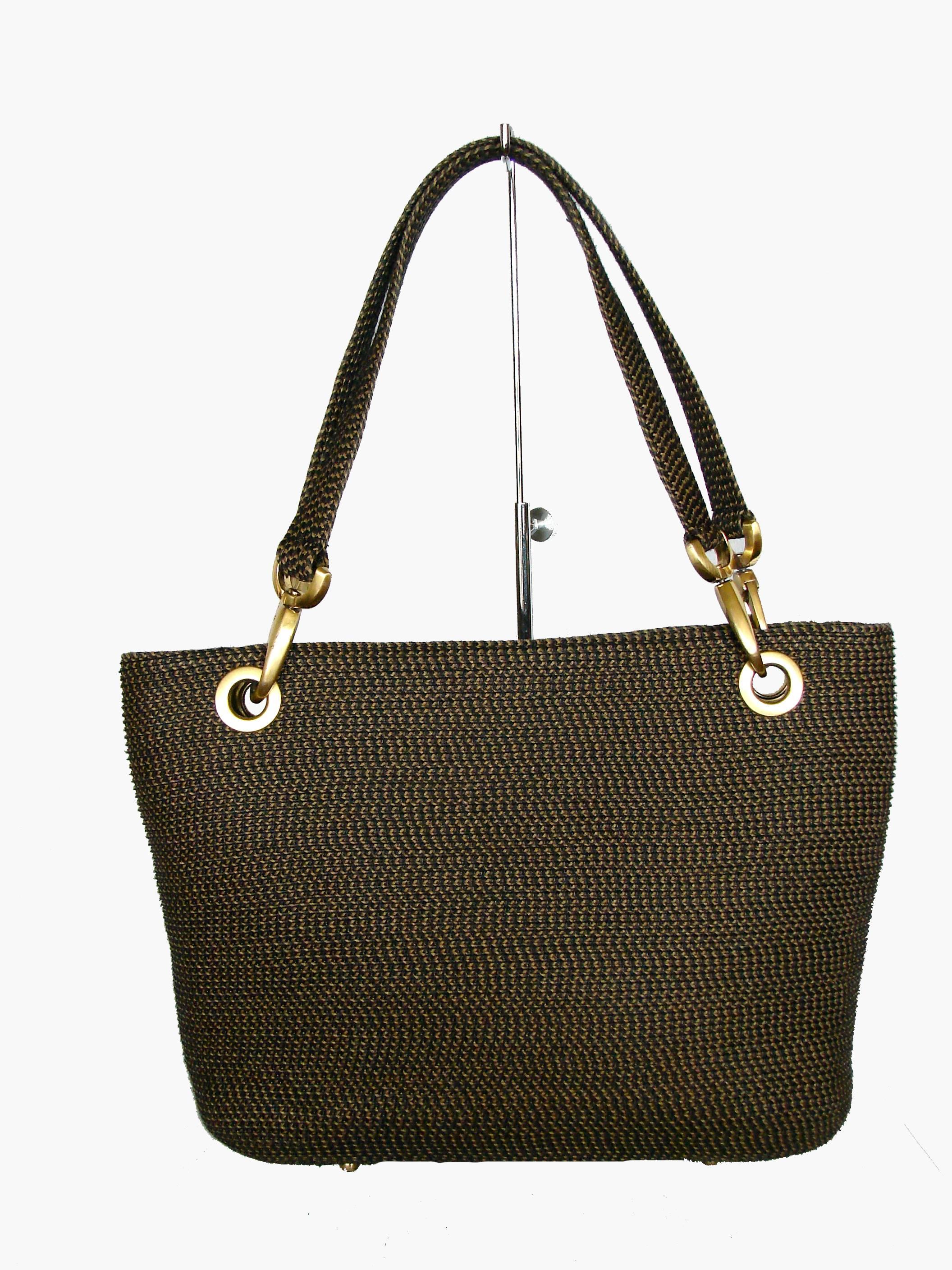 This tote was made by Eric Javits in the early 2000s and features his light weight 