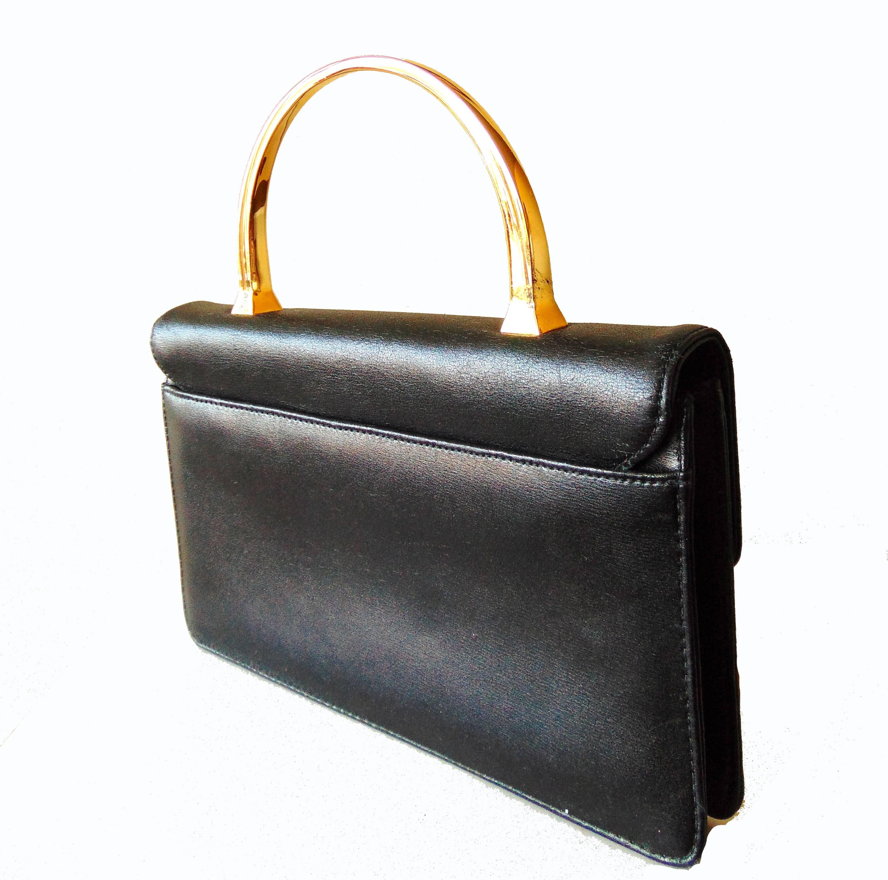 Chic Givenchy Black Leather Evening Bag with Gold Metal Top Handle 1980s In Excellent Condition In Port Saint Lucie, FL