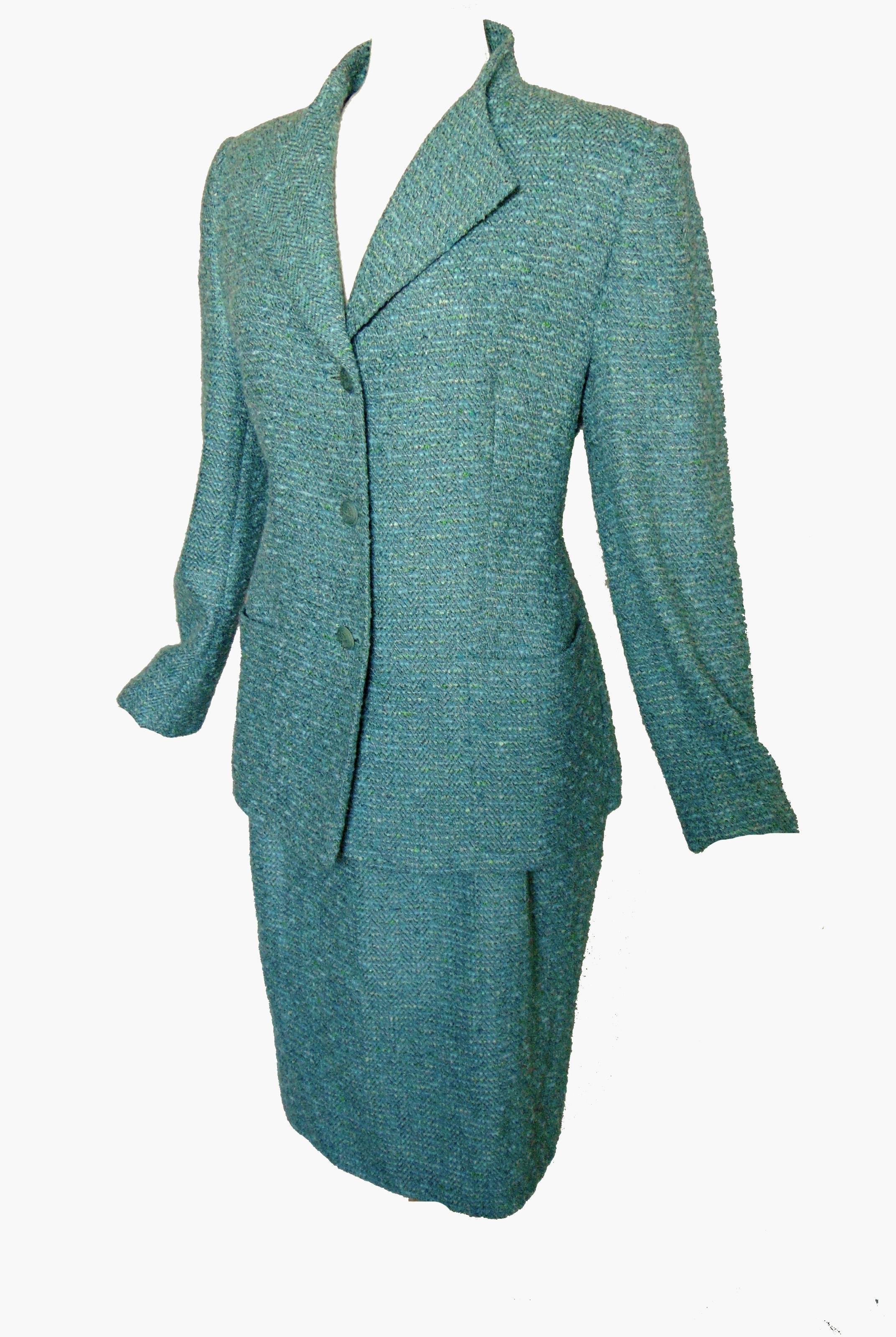 Here's a pretty jacket and skirt suit from Louis Feraud.  Made from a silk, wool and poly blend woven fabric in aqua, the weave features flecks of white and green, for a gorgeous texture and color!  Fully-lined and in excellent condition.  Tagged