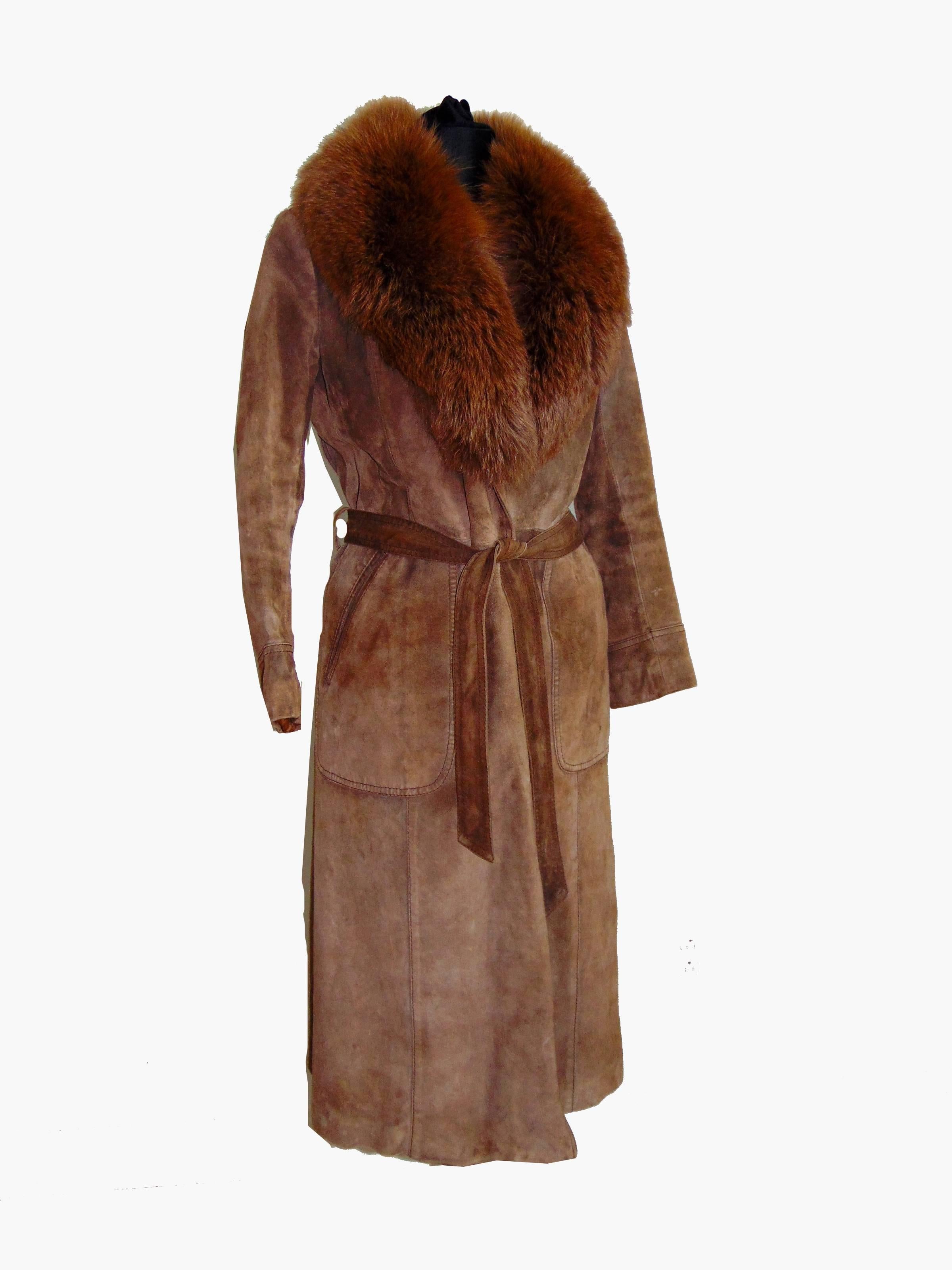 This fabulous vintage coat is so 70s Foxy Brown! Made by Rafael Italy from light brown suede leather, it features a plush fur collar and is lined in what appears to be Rex rabbit fur. (no content label)   It fastens with a single  button and it's