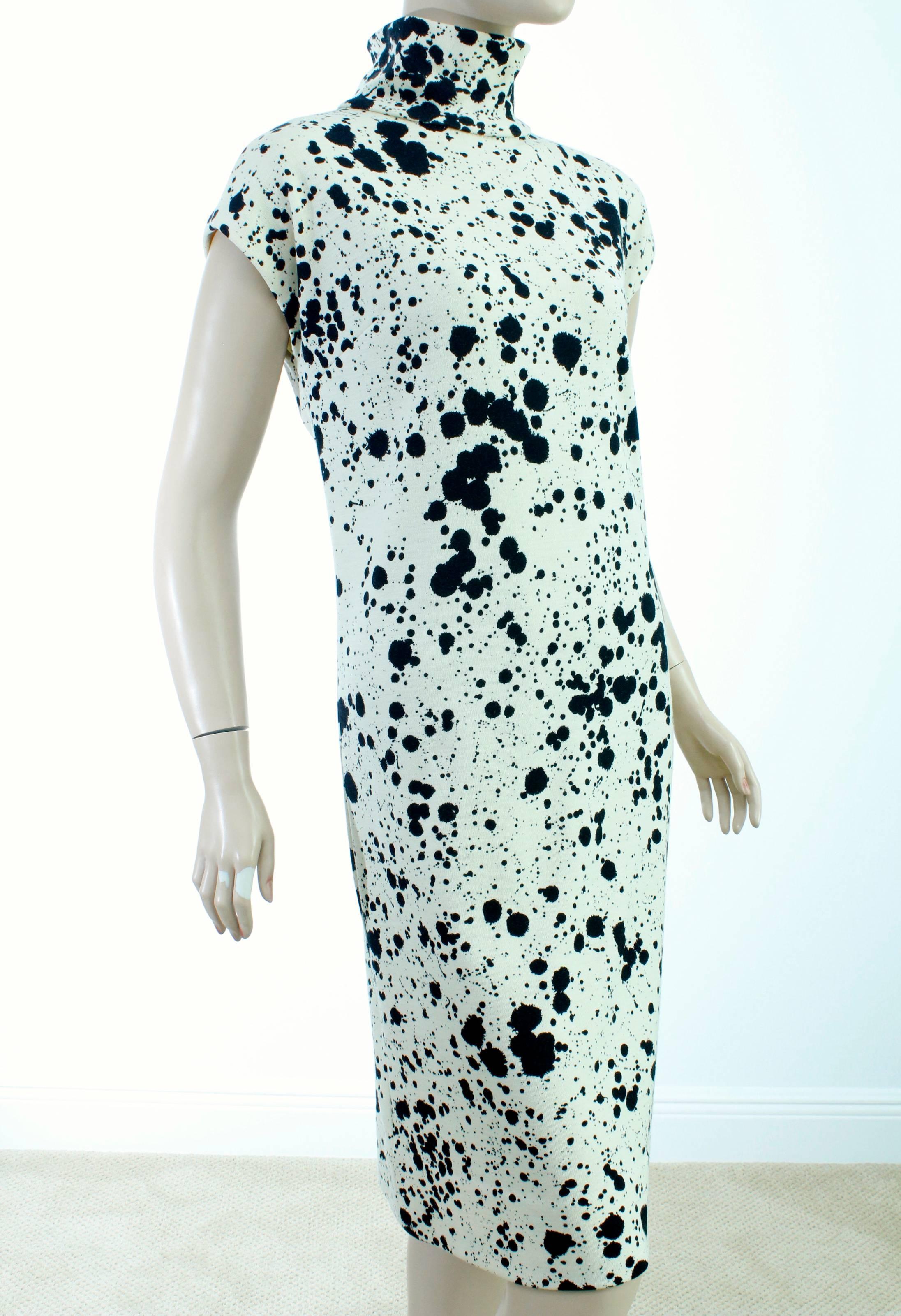 Here's an incredible vintage piece by the mother of modern American sportswear, Bonnie Cashin. Created in the late 70s, this wool dress is unlined and features a black paint spatter pattern against its cream white background. There's a photo of this