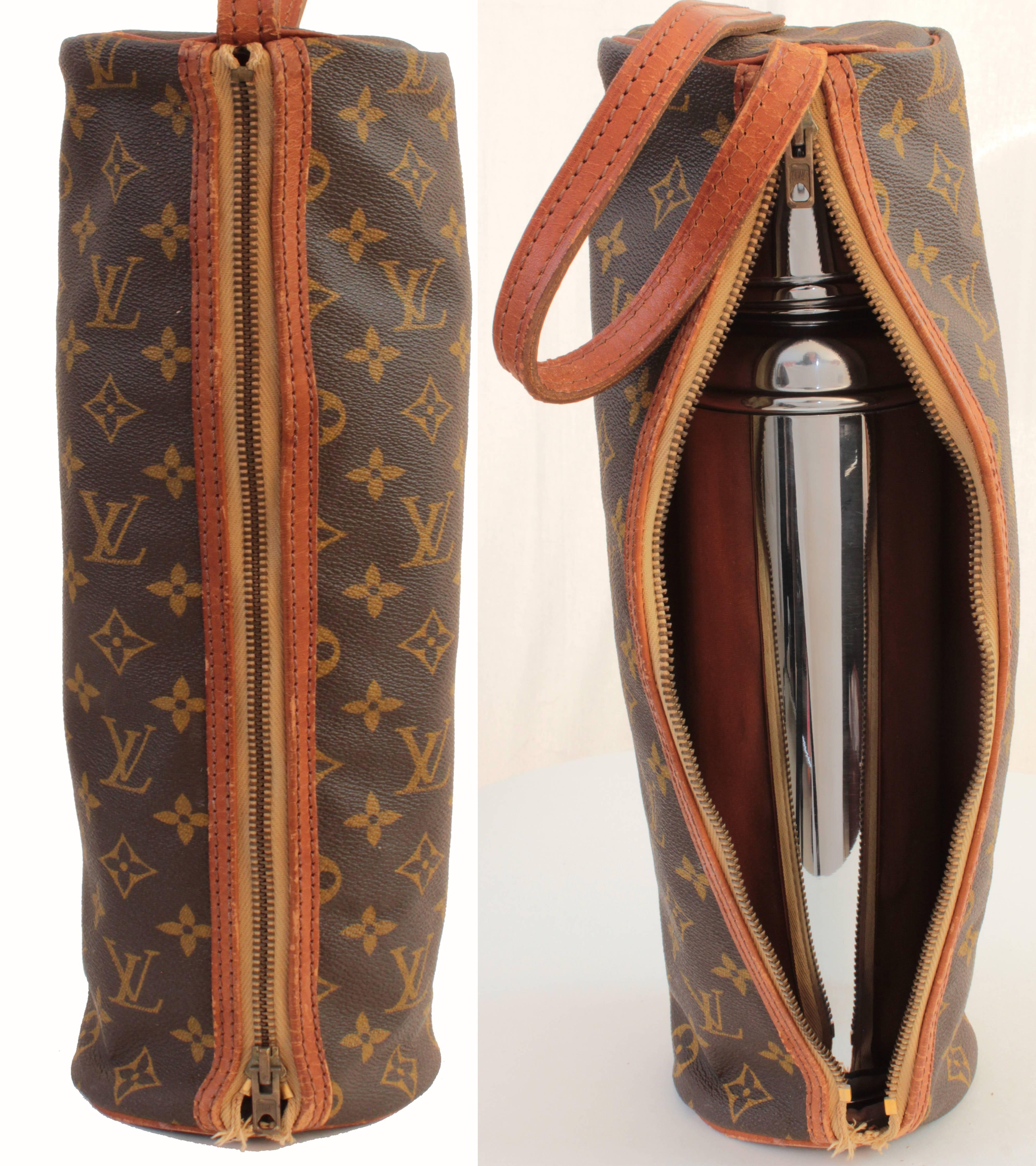 This incredibly rare set was made by Louis Vuitton and Thermid France, most likely in the early 1970s.  The case features Vuitton's signature monogram canvas and vachetta leather trim.  The Thermid flask includes the original (and working) vacuum