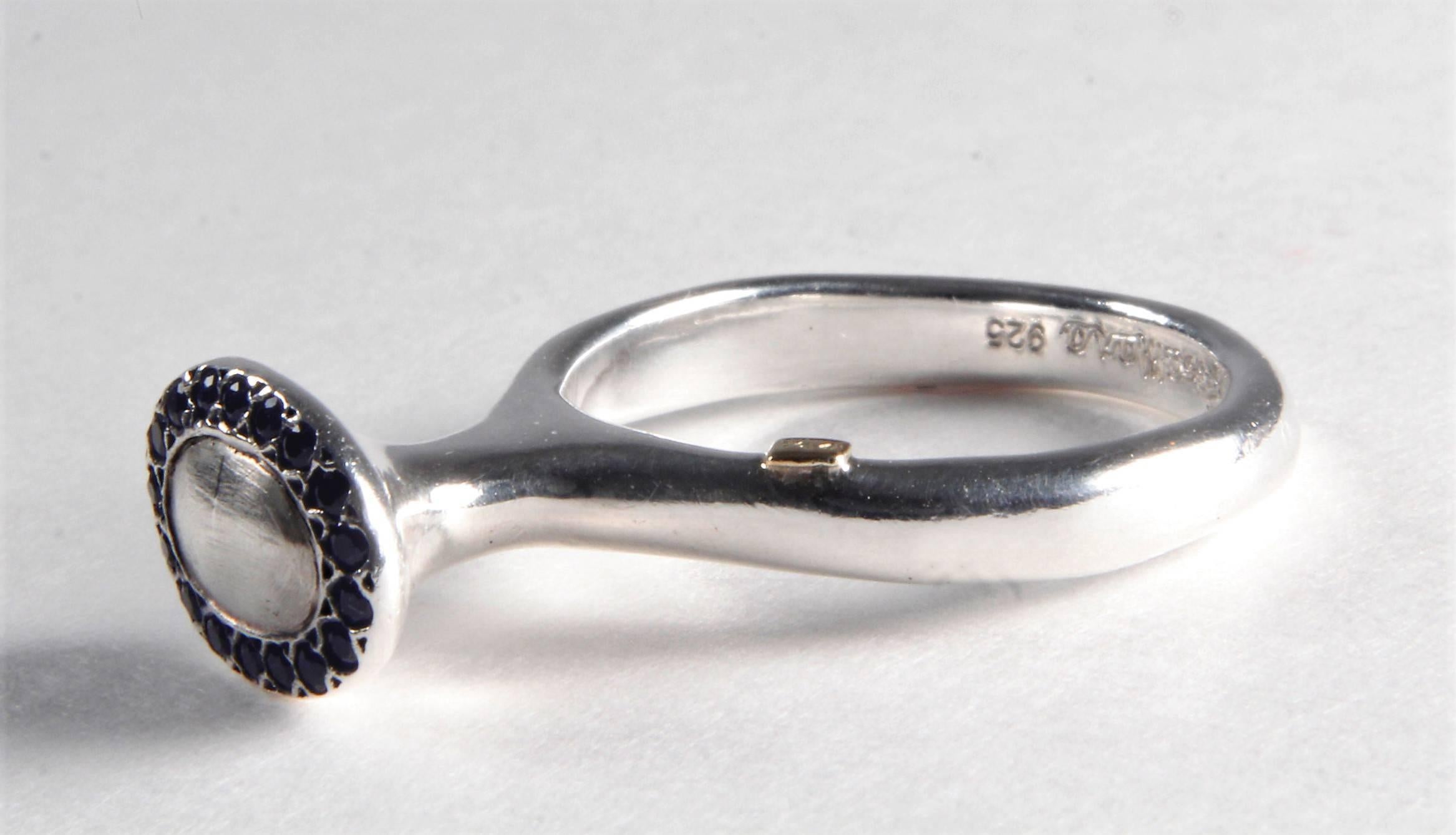 This one of a kind ring was made Lebanese designer, Rosa Maria, who creates fascinating avant-gardiste jewelry with unstructured layered design mixing silver, gold, zinc and copper with a wild array of stones, such as rose cut, diamonds with
