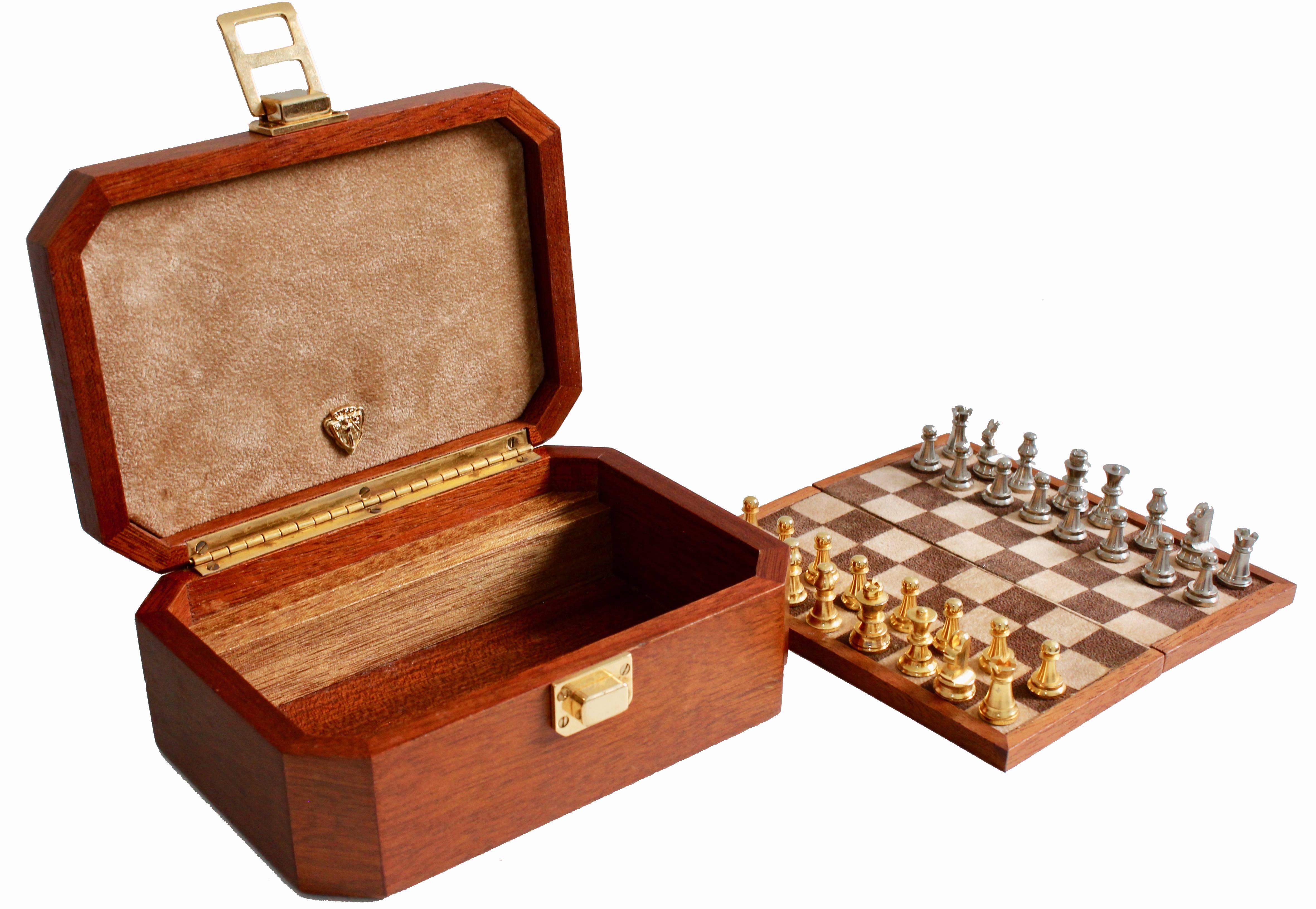 Here's a very rare burl wood box with chess set from Gucci, most likely made in the late 1970s.  Perfect for travel, as a show piece for your bar or as a gift, this fabulous set includes the Burl wood latched box with sueded bottom and top lining,