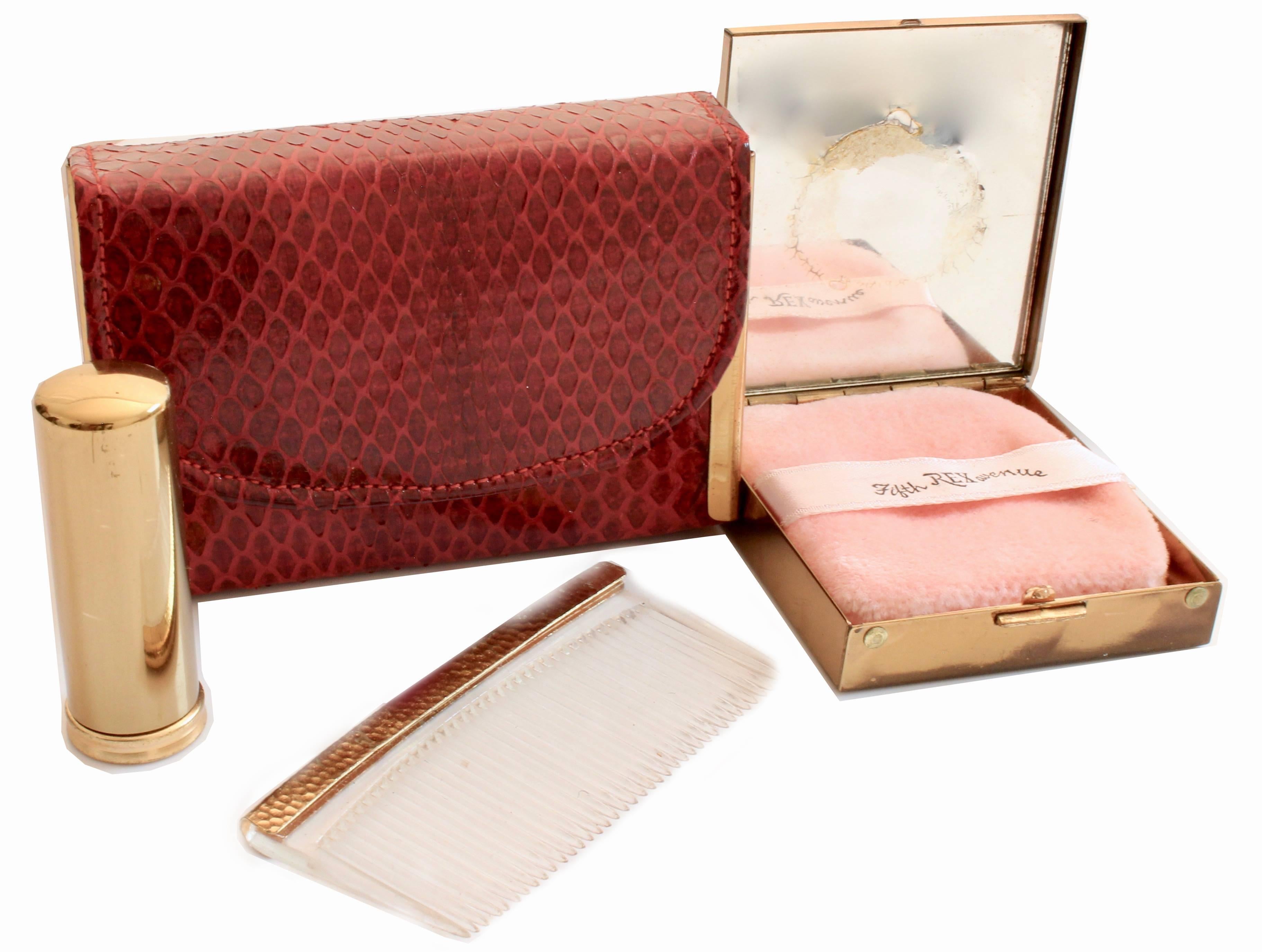 Here's a cool vintage Lizard mini clutch by REX FIFTH AVENUE that comes with a gold metal powder compact with mirror & puff, lipstick holder and comb.  Very rare set that was most likely made in the early 1950s! All pieces in good condition given