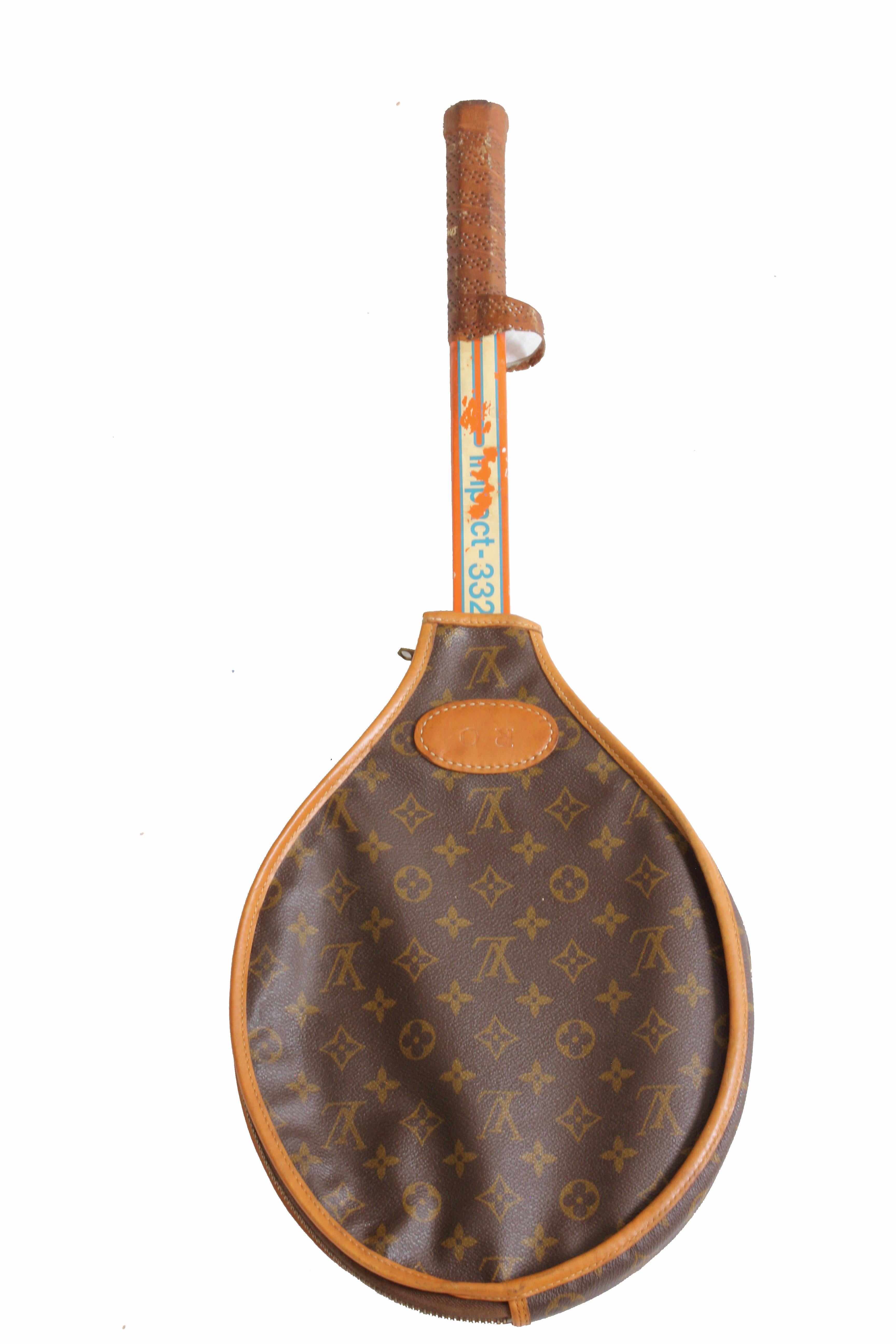 Here's a great vintage piece for the tennis aficionado or interior decorator - a Louis Vuitton tennis racquet cover, made under special license by The French Company and sold by high end retailers such as Saks and Neimans from the 70s through the