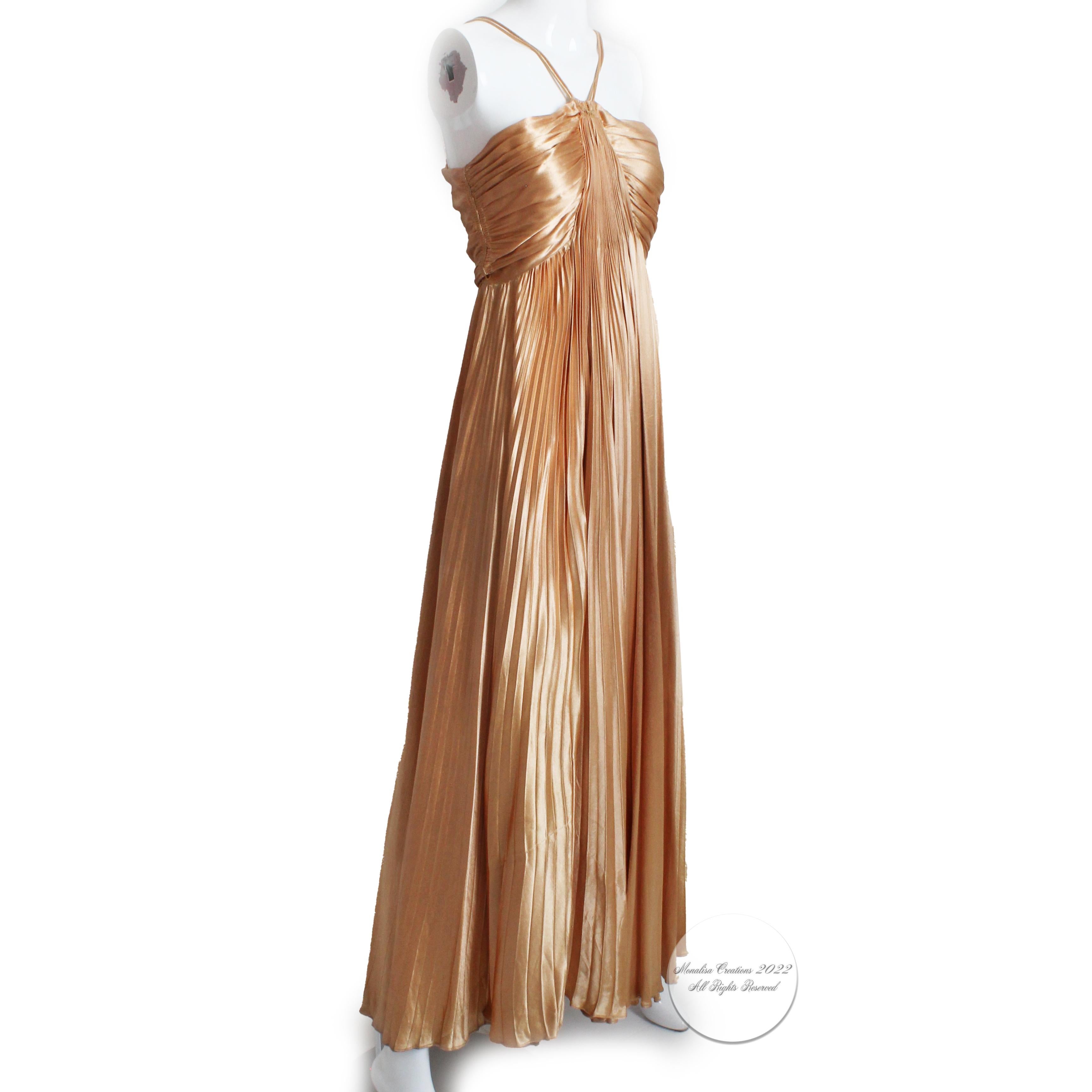 Vintage evening gown with fabulous pleating detail, most likely made in the late 1940s. Labeled Original Design Pat. Pend. US, this piece just screams GODDESS! Made from bronze-hued gold weighty satin fabric, it has micro-pleating that starts at the