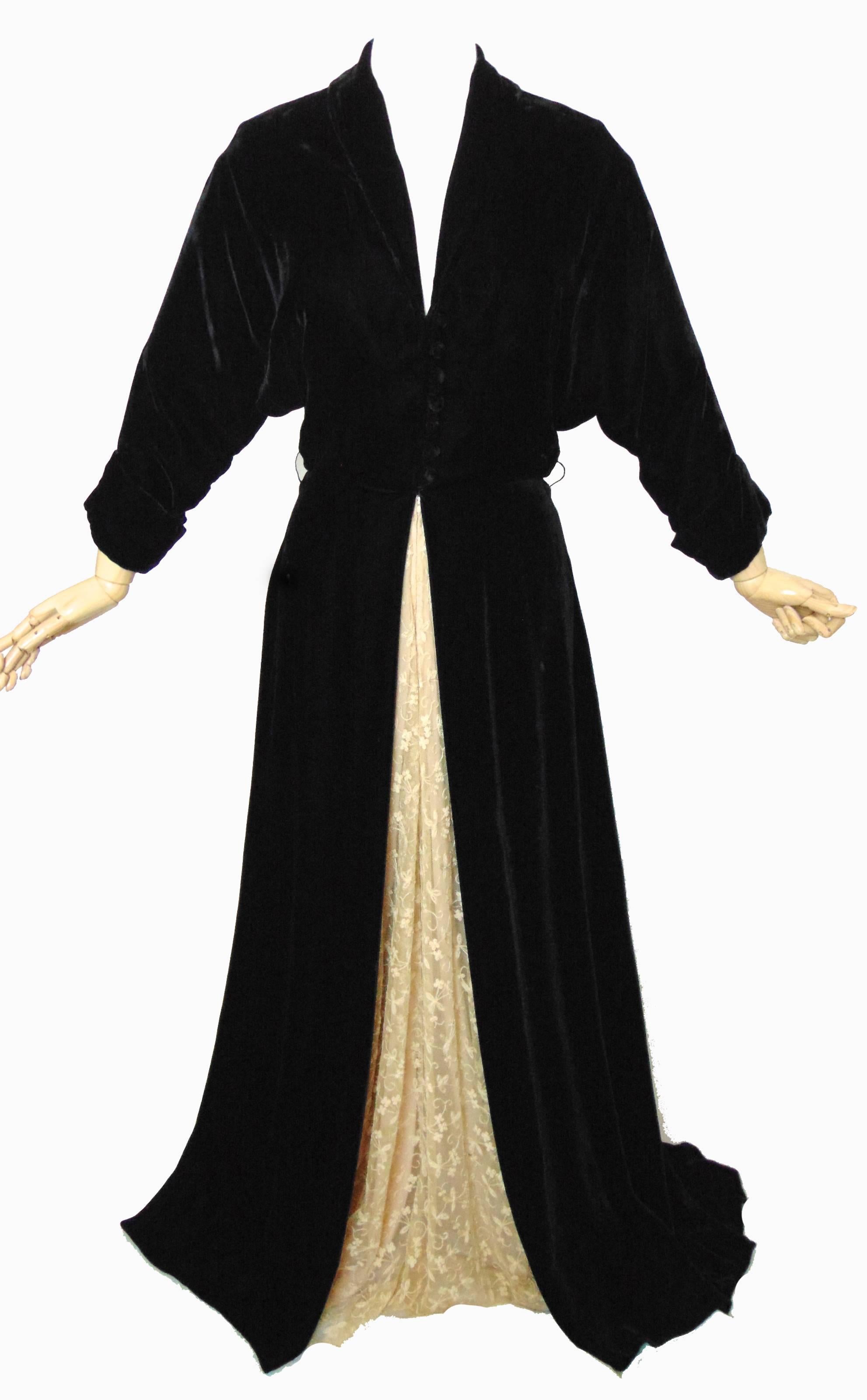 This formal evening gown is labeled Henri Bendel and was likely manufactured sometime in the 1940s.   Henri Bendel was an upscale retailer which opened in Greenich Village in 1895 and was one of the first retailers to sell Coco Chanel designs in the