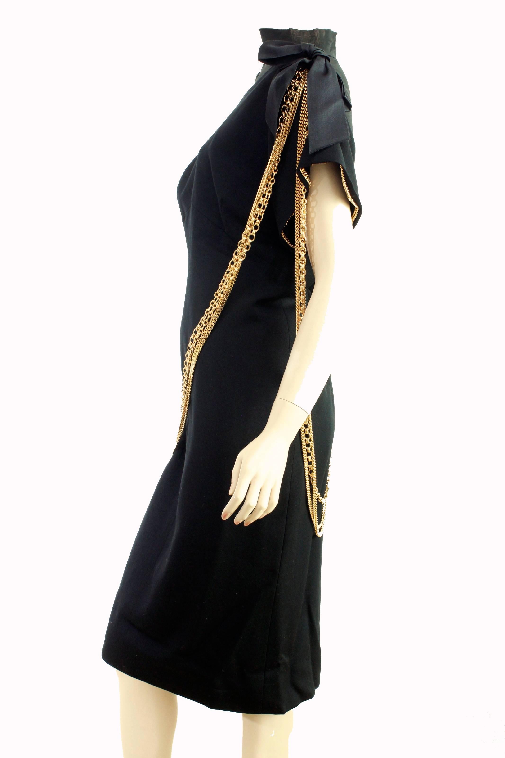 chanel black dress with gold chains