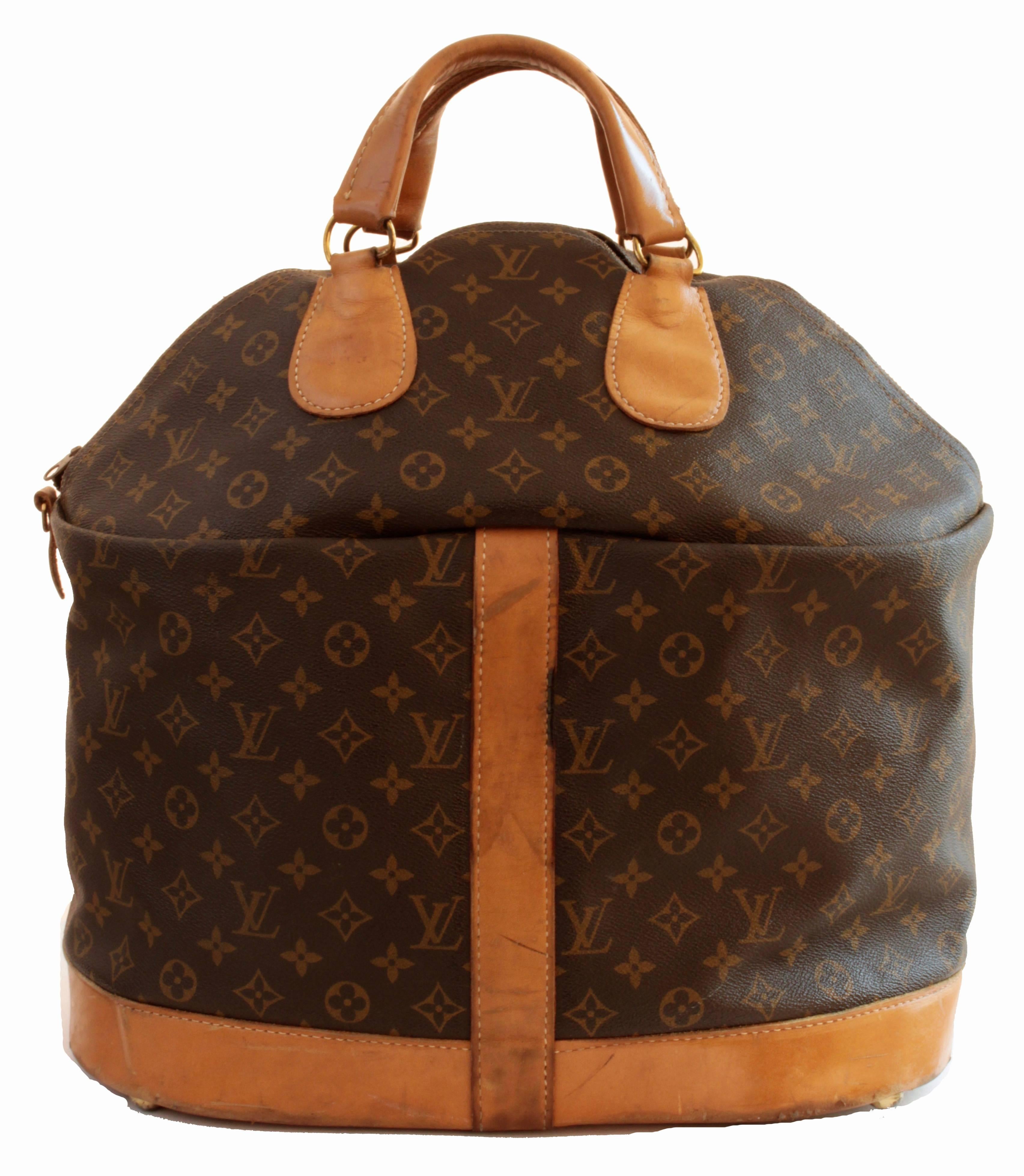 This large travel bag was originally sold by Saks 5th Ave and made under special license by The French Company for Louis Vuitton, long before LV had a boutique presence in the USA.  Produced for only a short period, these incredible bags are so hard