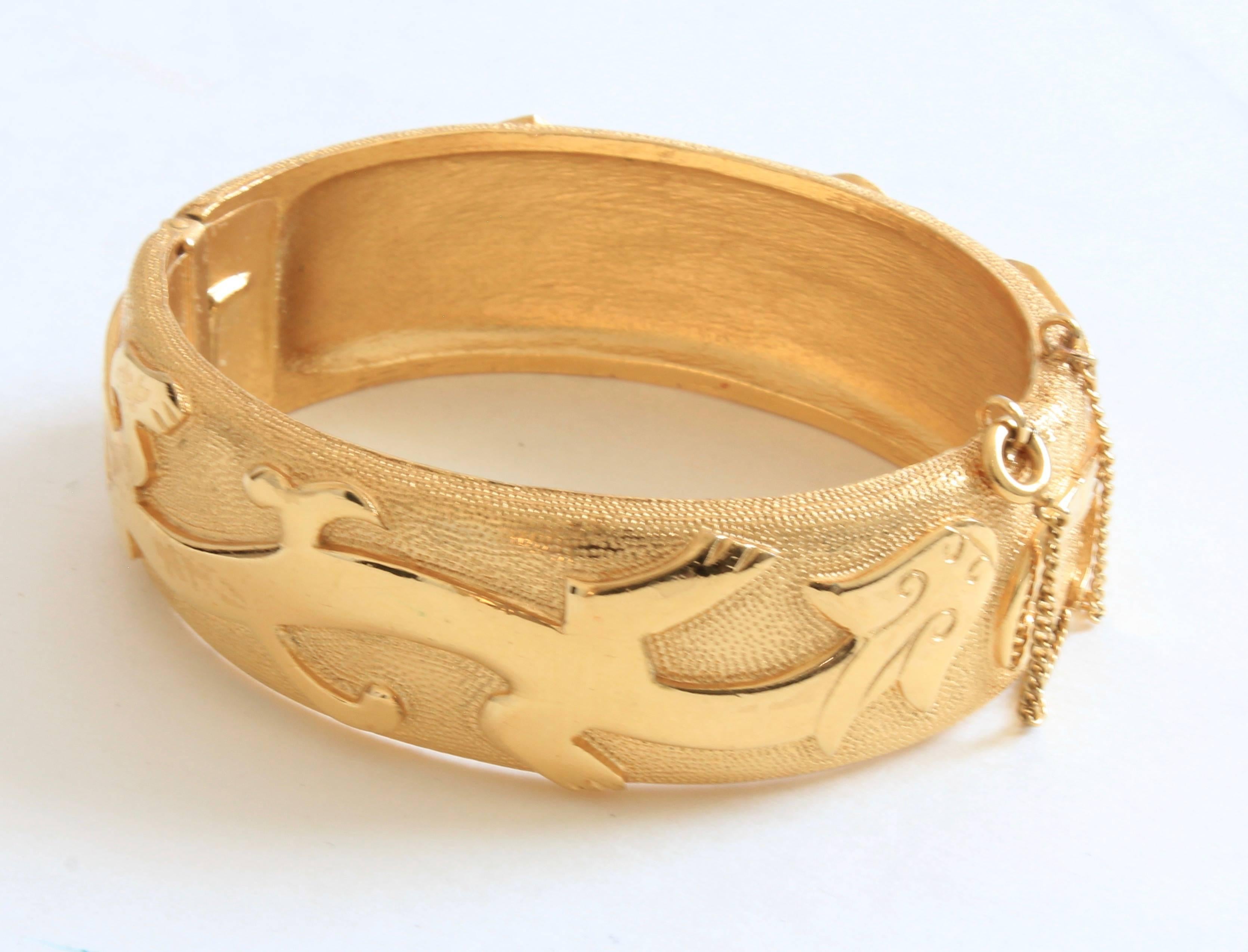 Trifari Vintage Dragon Motif Polished Gold Metal Hinged Clamper Bracelet 1960s  1