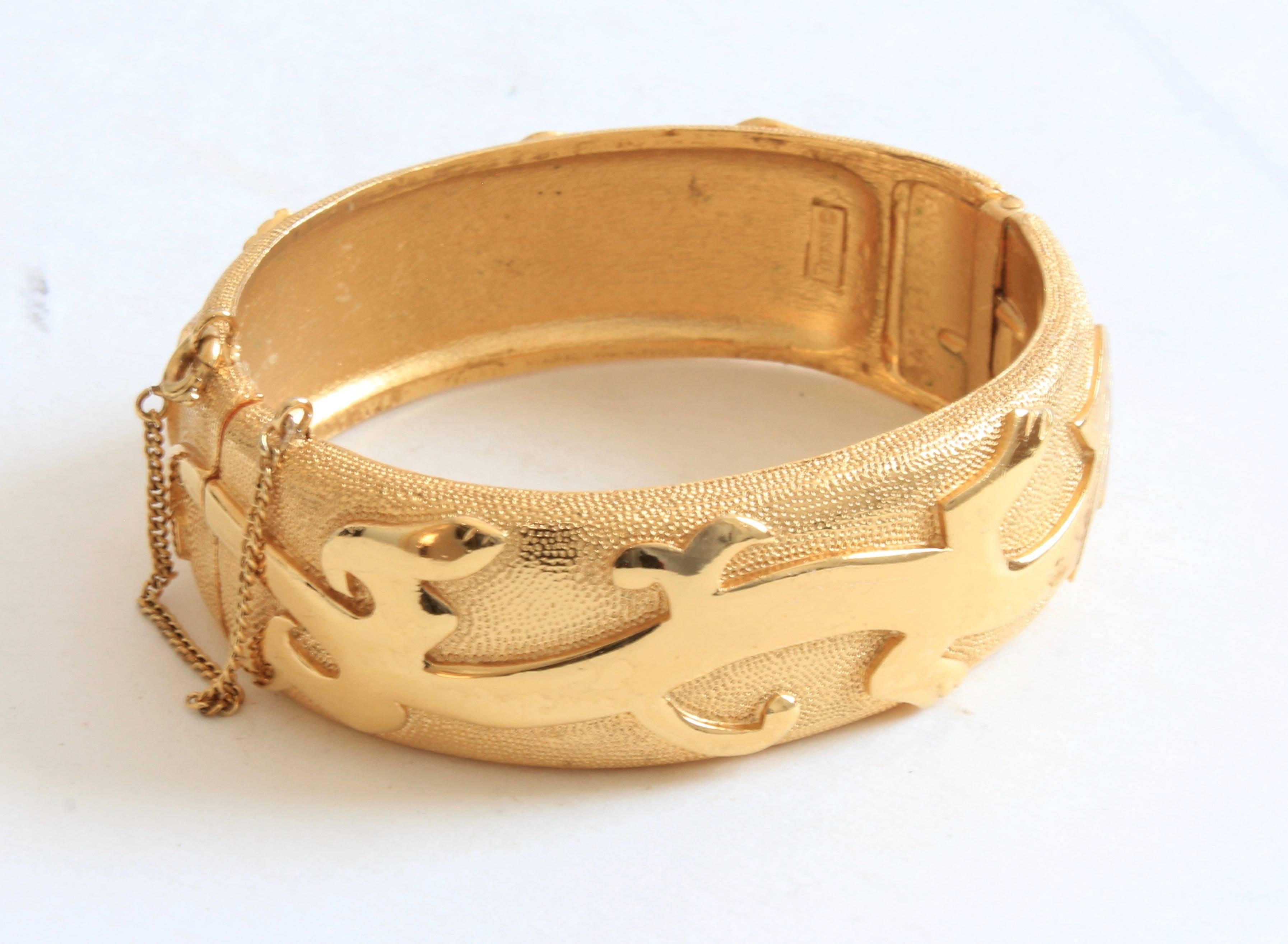 Modernist Trifari Vintage Dragon Motif Polished Gold Metal Hinged Clamper Bracelet 1960s 