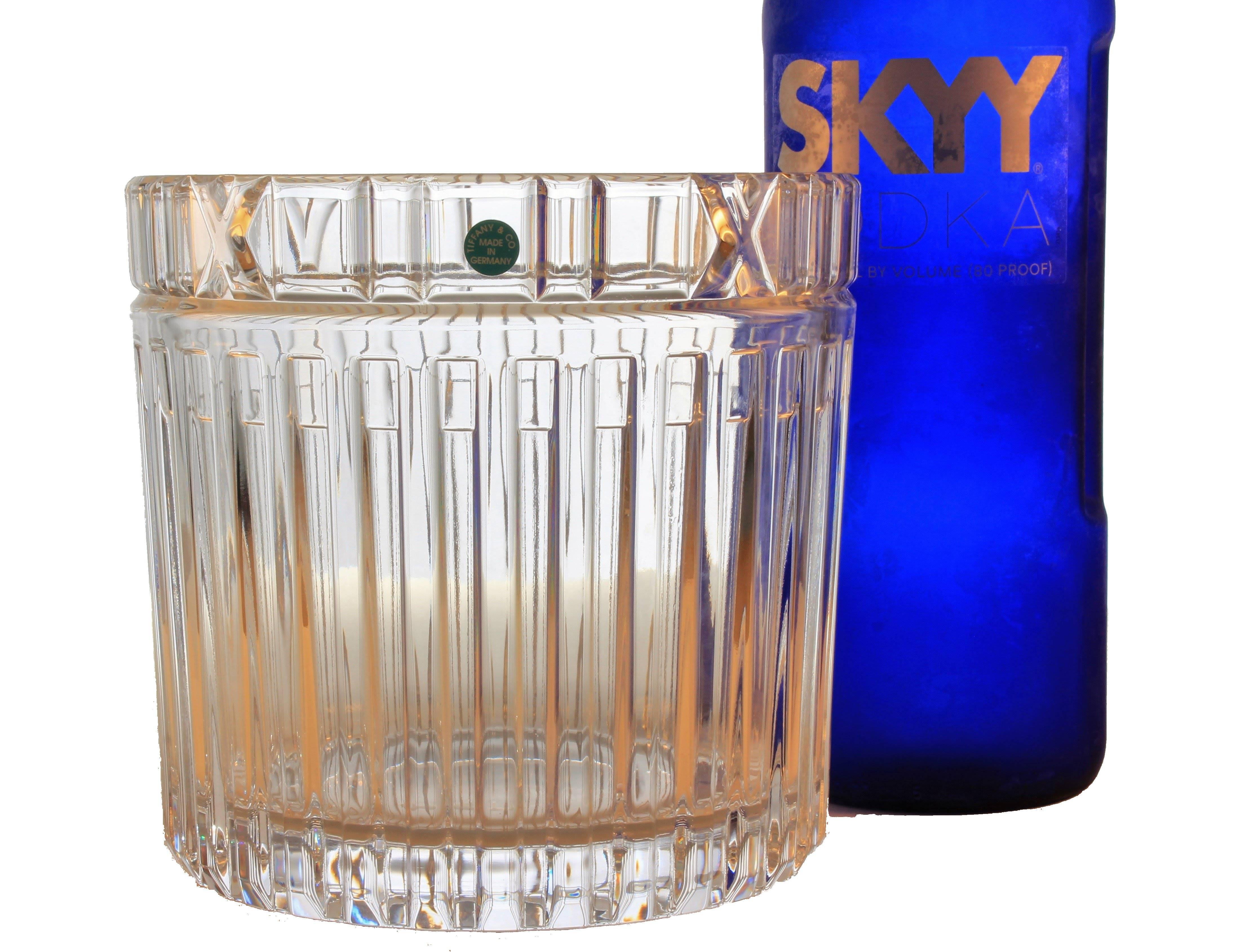 This crystal champagne ice bucket or cooler is from Tiffany & Co., made in the Atlas pattern, which features a Roman numeral motif along the rim with a linear design on the base. This pattern is named for the Atlas clock that has been above the