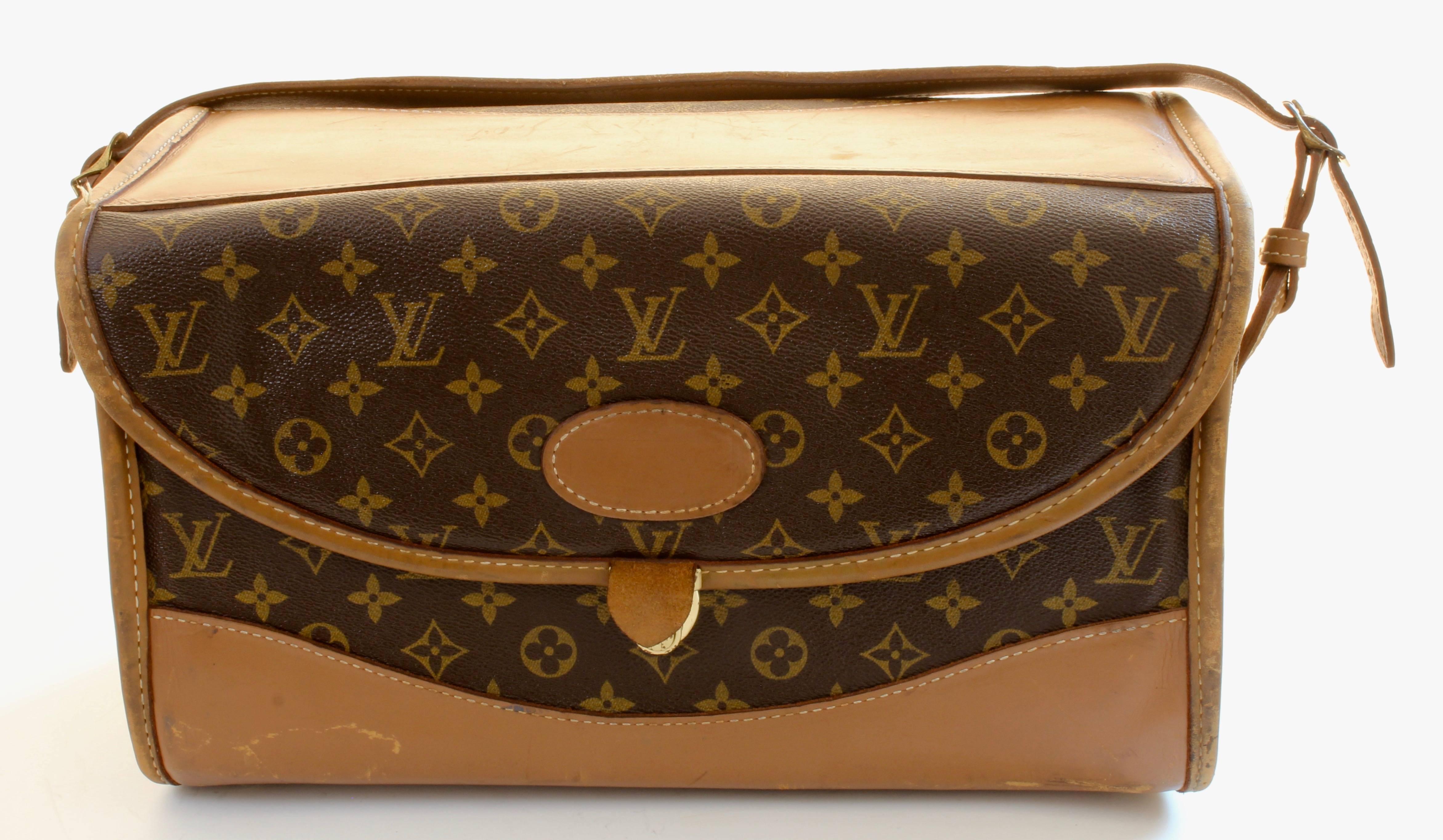 Travel in style with this chic beauty or train case, made in the 70s by The French Company under special license from Louis Vuitton, long before LV had a boutique presence in the USA. Sold in stores such as Saks and Neiman's, these LV x FC bags were
