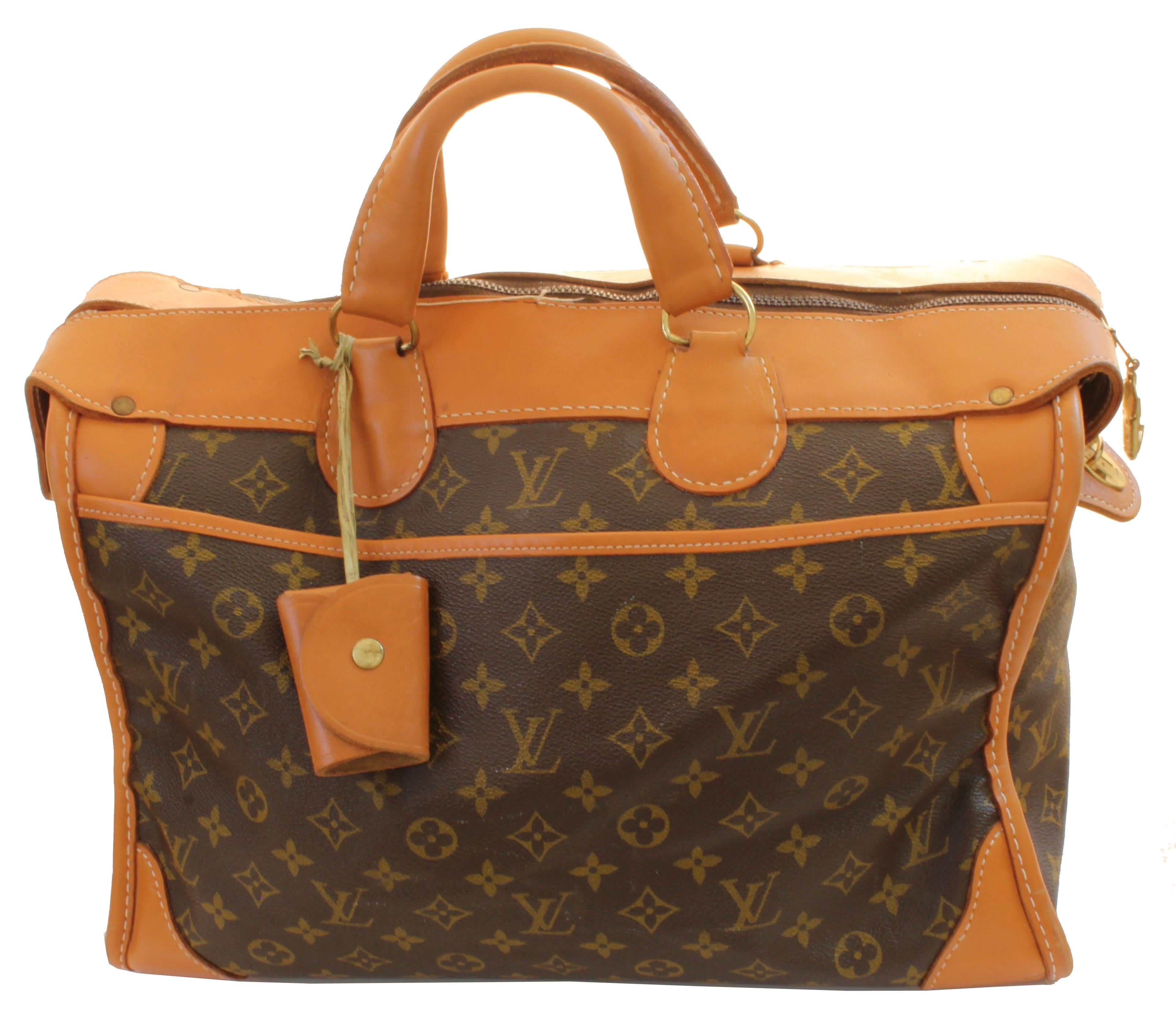 Travel in style with this Louis Vuitton monogram carry on or keepall bag, made by The French Company under special license for Louis Vuitton, long before LV established their own manufacturing in the USA.  Made from monogram canvas and trimmed in