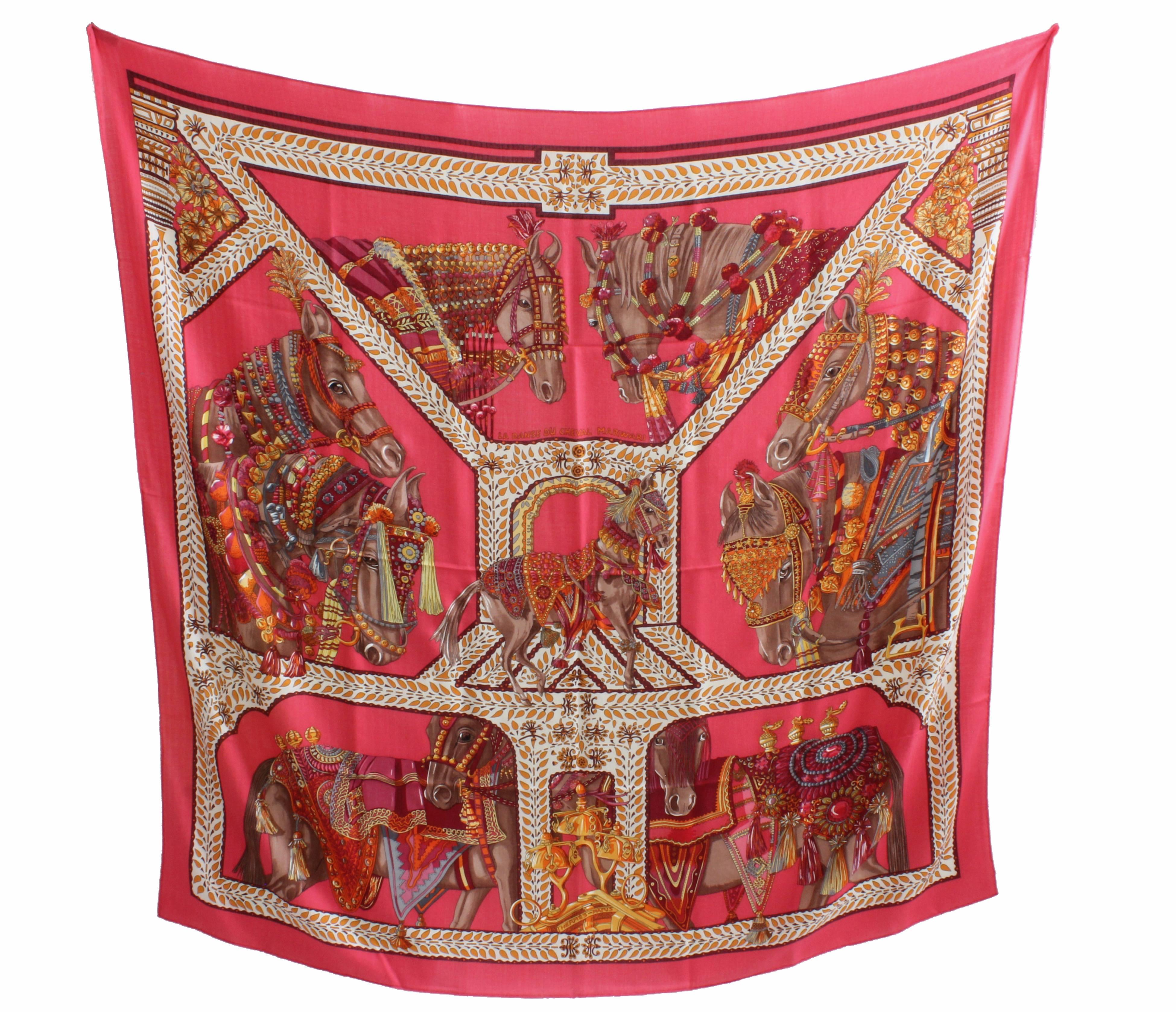 This is one of our favorite Hermes La Maison Des Carres prints from designer Annie Faivre - and in a gorgeous color way of Rose VIF, orange and fuchsia. La Danse du Cheval Marwari was released as a 140cm (55 inch) cashmere and silk shawl in 2008 and