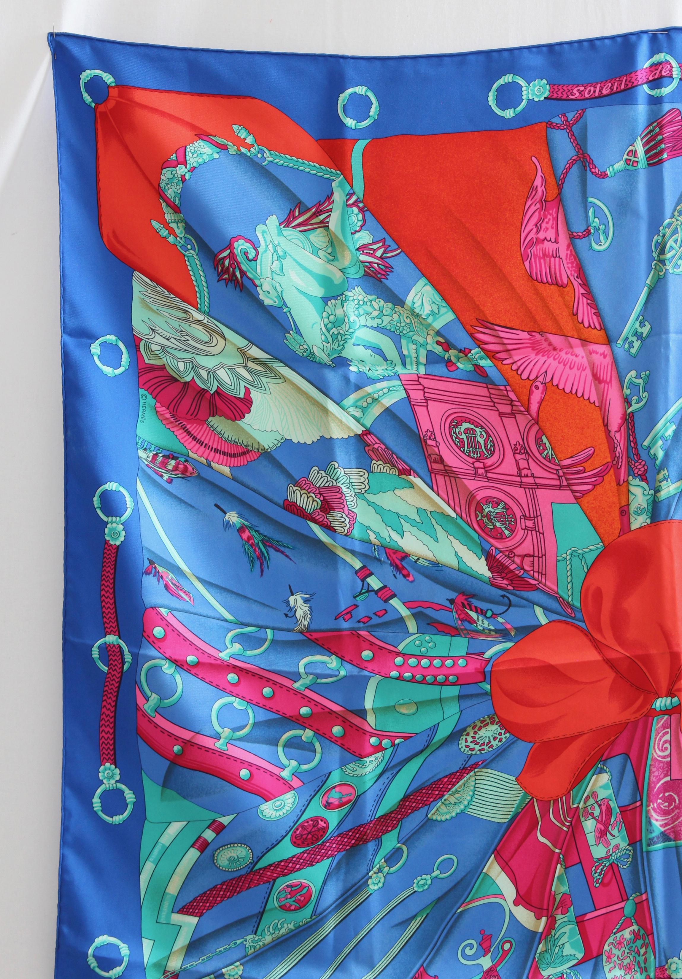 This fabulous silk scarf or shawl was designed by Caty Latham for Hermes and released in 1995 and is so hard to find in this colorway.  Latham's history designing for the house covers more than 5 decades, and she's designed almost 50 gorgeous carres