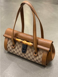 1990s Gucci monogram shoulder bag with bamboo detail