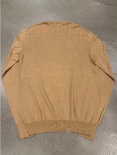Pull en maille usée de la collection printemps-été 2005 de Dior par Hedi Slimane, vu lors du défilé