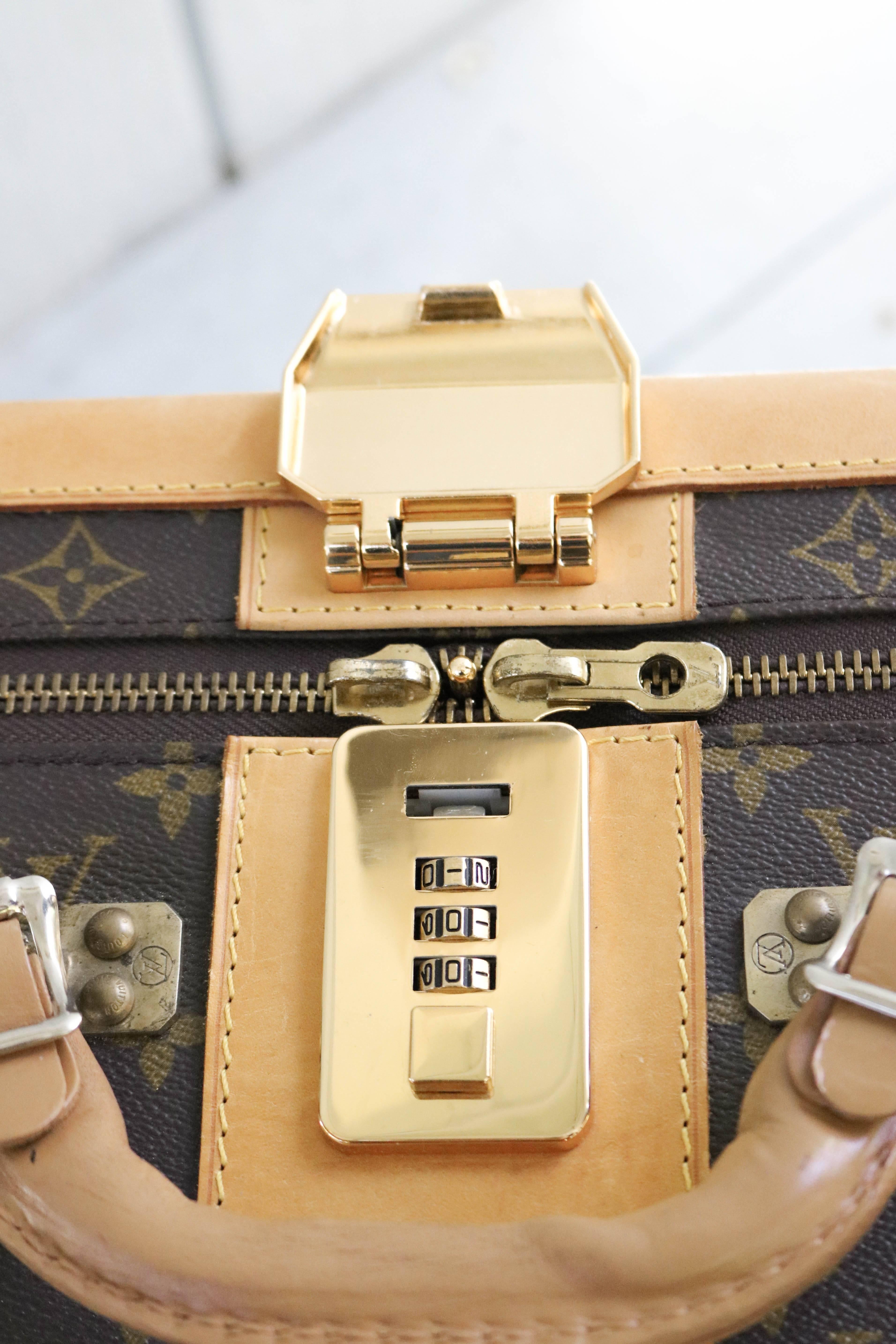 Offered is an extremely rare piece from the LOUIS VUITTON travel collection. One of three pieces in a set, this is the largest size with a 70cm dimension. 
Monogram coated canvas with Vachetta leather trim , bronze and gold-tone hardware